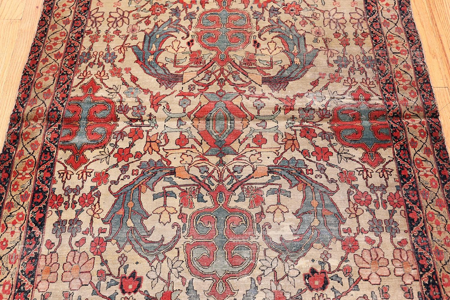 Antique shabby chic Persian Kerman rug, country of origin: Persia, date: circa late 19th century. Size: 4 ft x 6 ft 7 in (1.22 m x 2.01 m).

