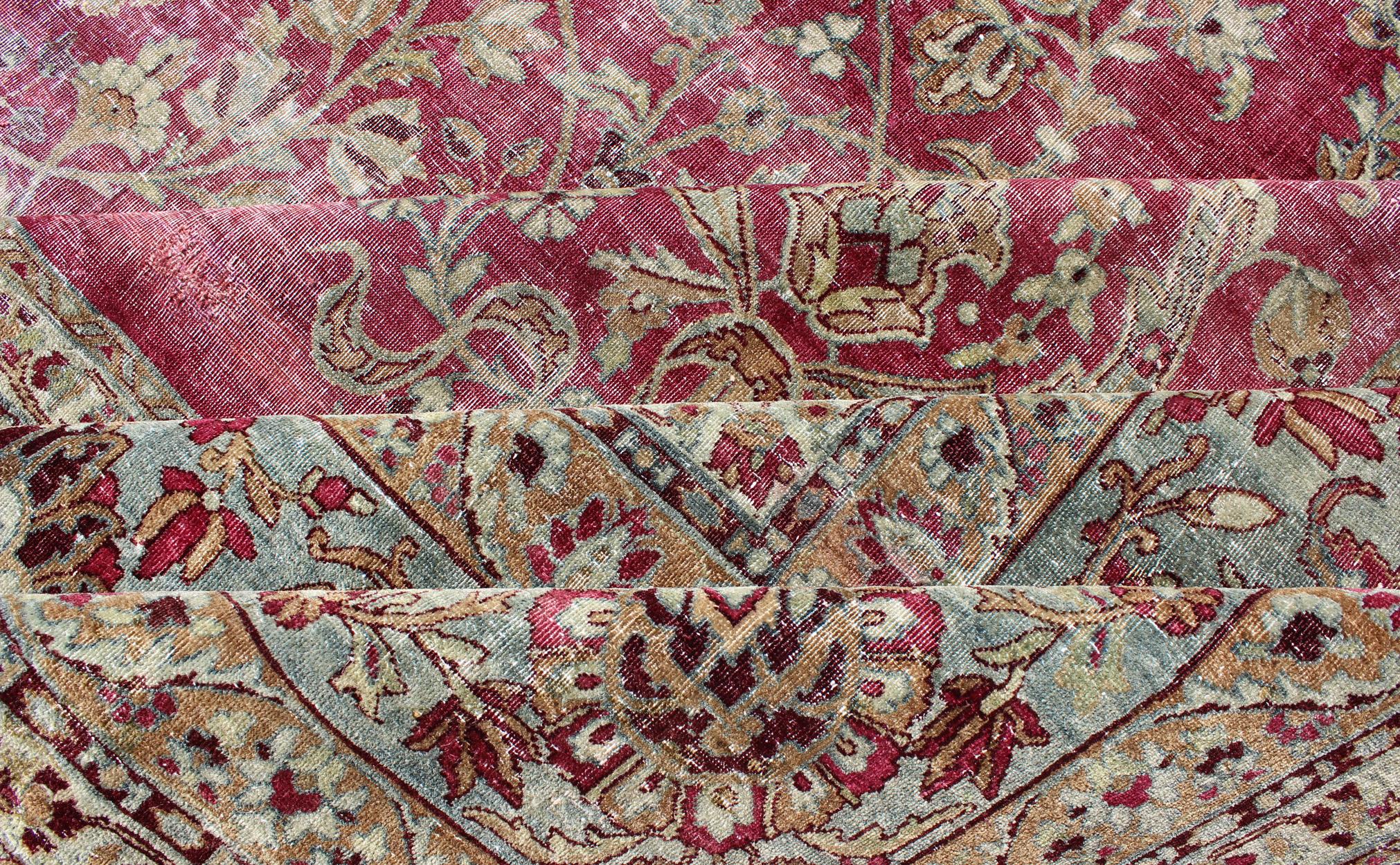 Distressed Antique Persian Lavar Kerman Rug in All-Over Intricate Floral Design In Distressed Condition For Sale In Atlanta, GA