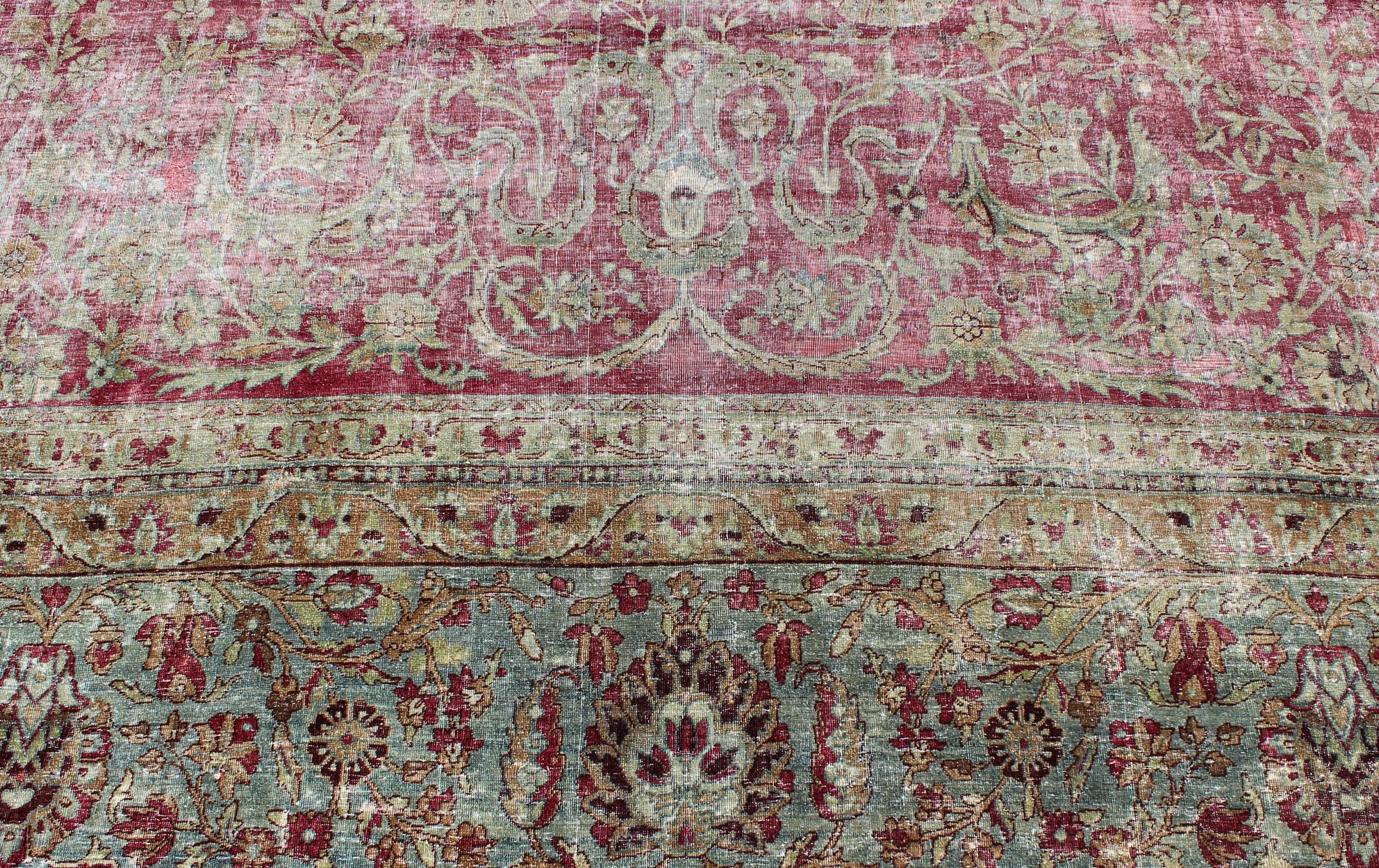 Distressed Antique Persian Lavar Kerman Rug in All-Over Intricate Floral Design For Sale 1