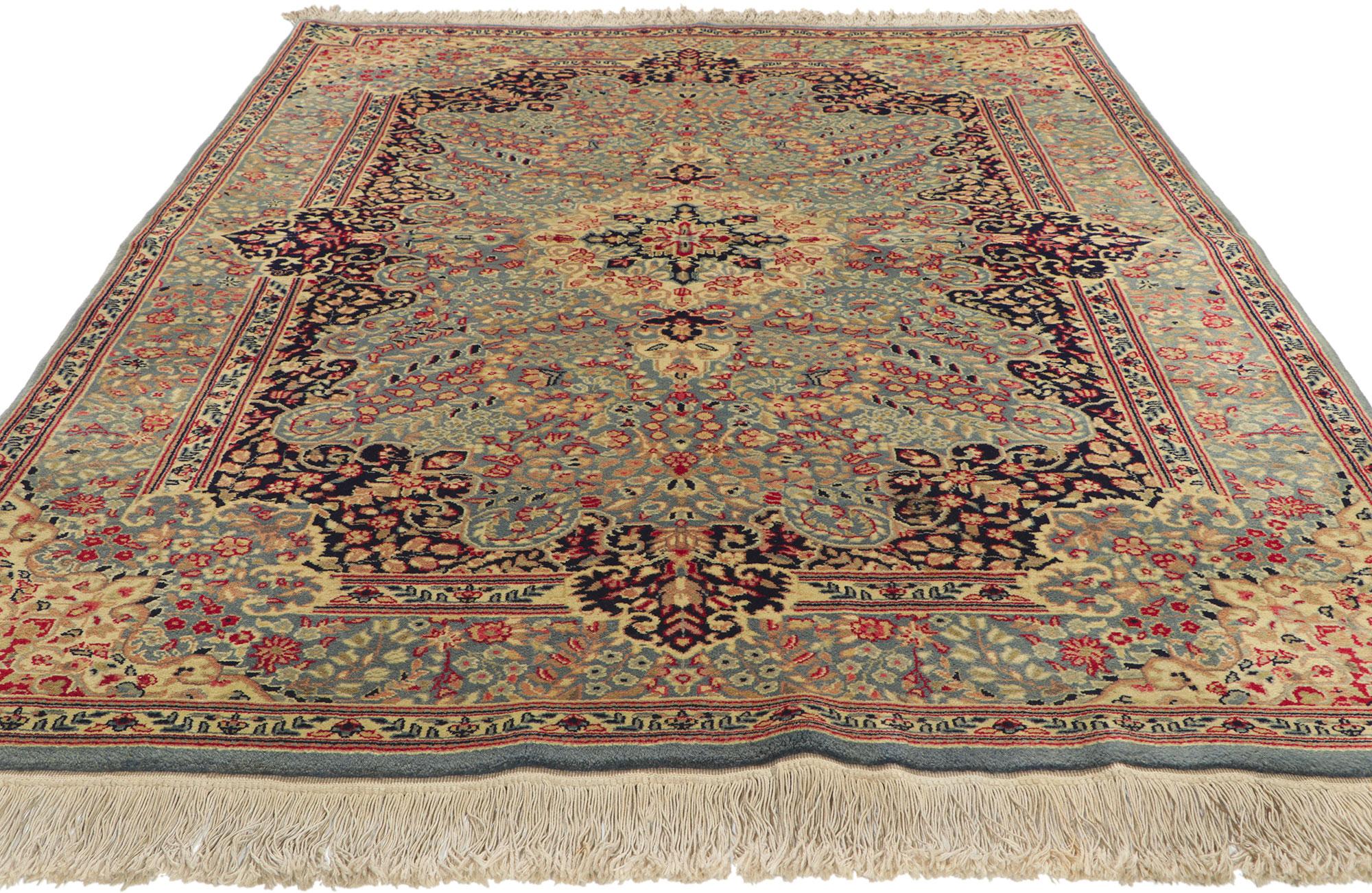 Wool Antique Persian Kerman Rug with Decorative Elegance For Sale