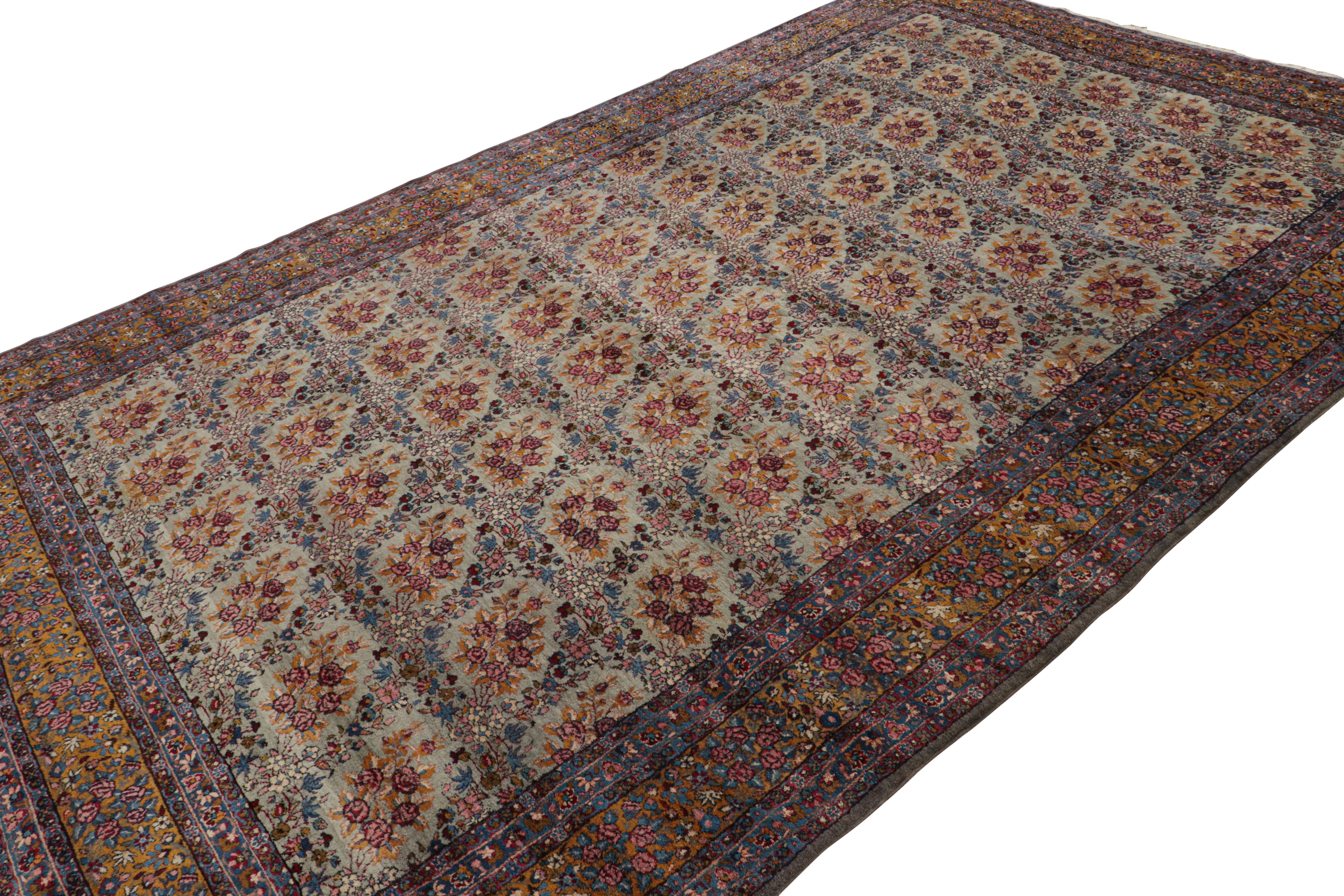 Hand-knotted in wool, an antique 9x14 Persian Kerman rug from the 1920s - latest to join Rug & Kilim’s repertoire of coveted antique pieces.

On the Design:

This piece is polychromatic with a notable light blue-green field which underscores a most