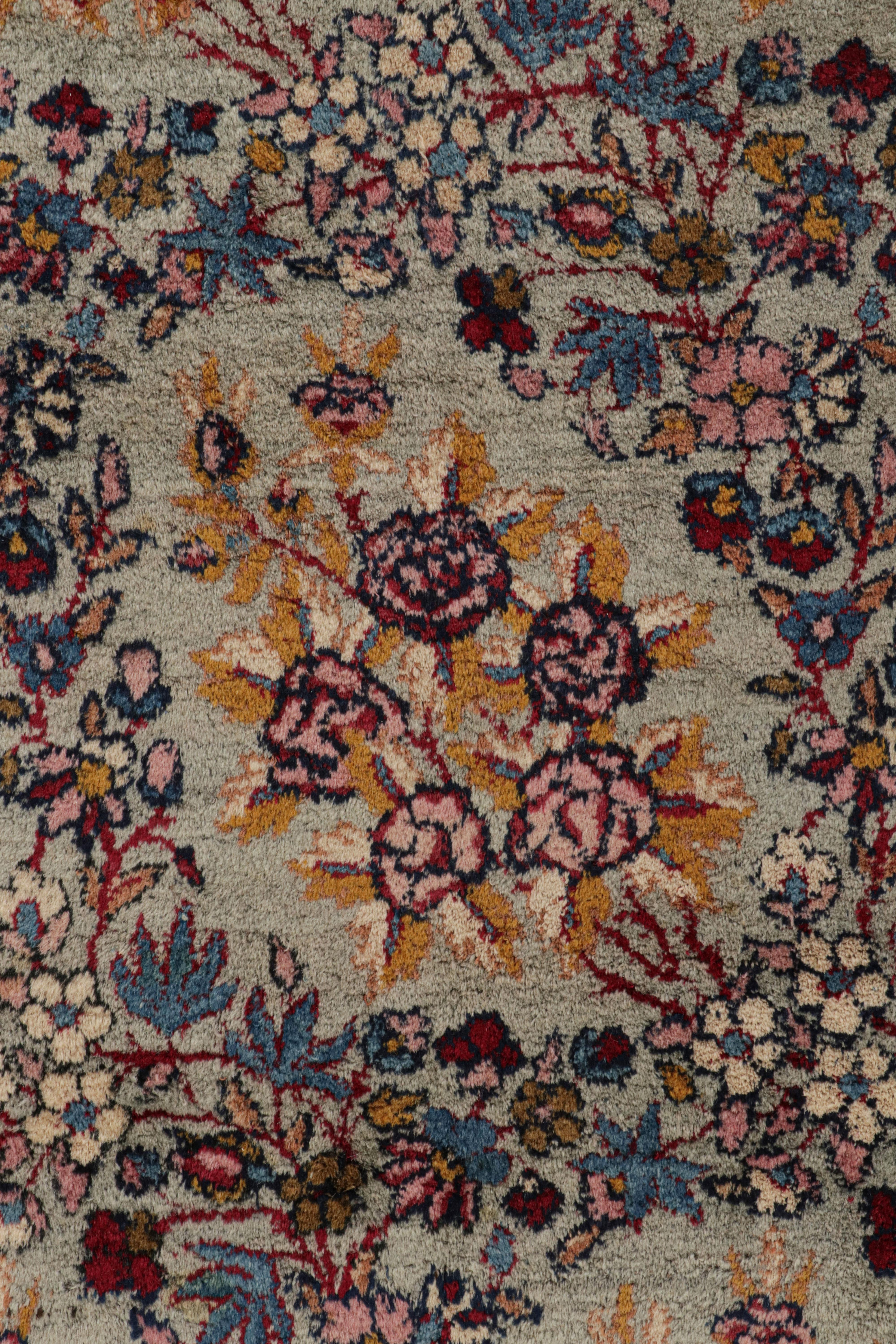 Wool Antique Persian Kerman Rug with Polychromatic Floral Patterns by Rug & Kilim For Sale