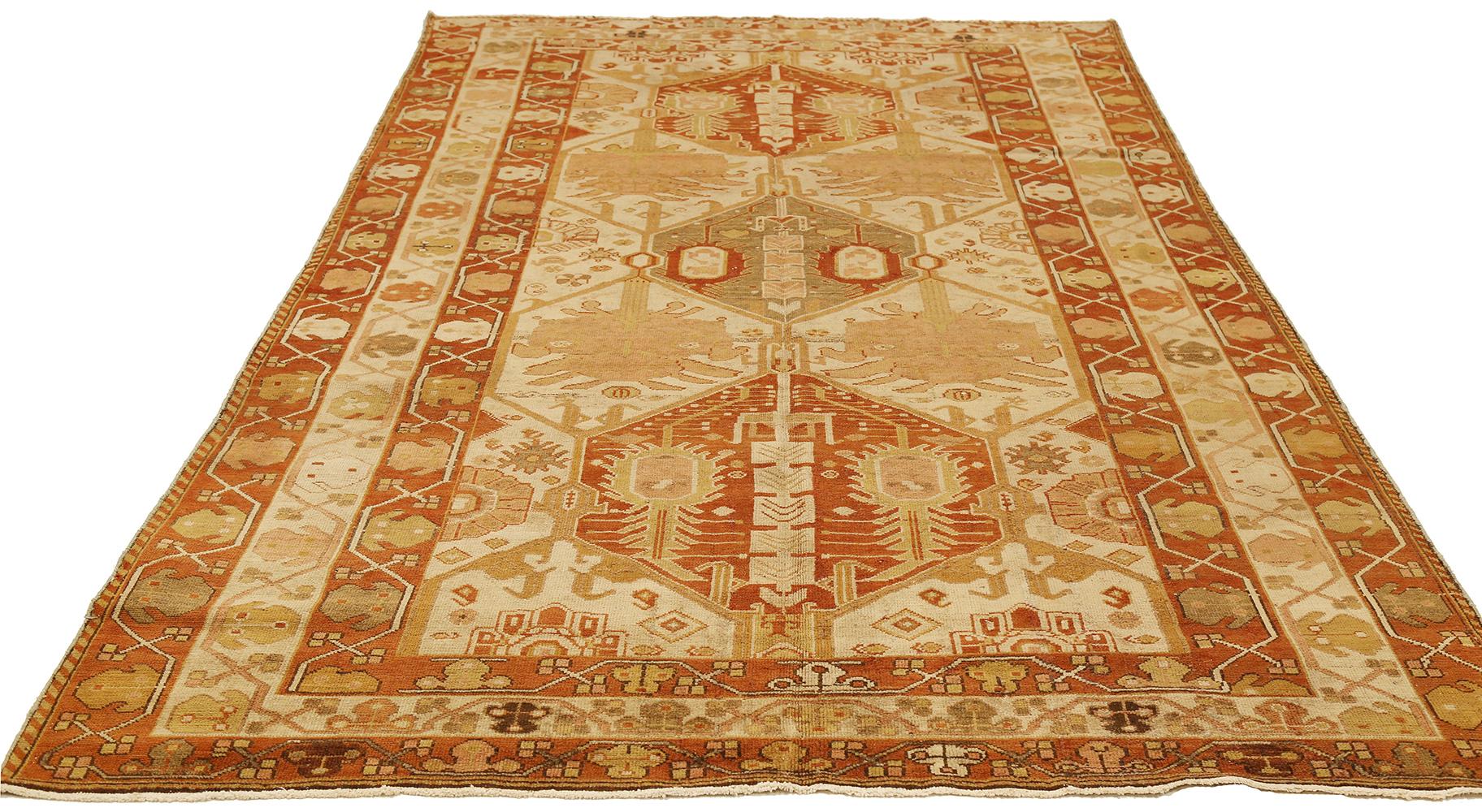 Antique Persian rug handwoven from the finest sheep’s wool and colored with all-natural vegetable dyes that are safe for humans and pets. It’s a traditional Kerman weaving featuring an elegant botanical medallions with an ensemble of floral designs