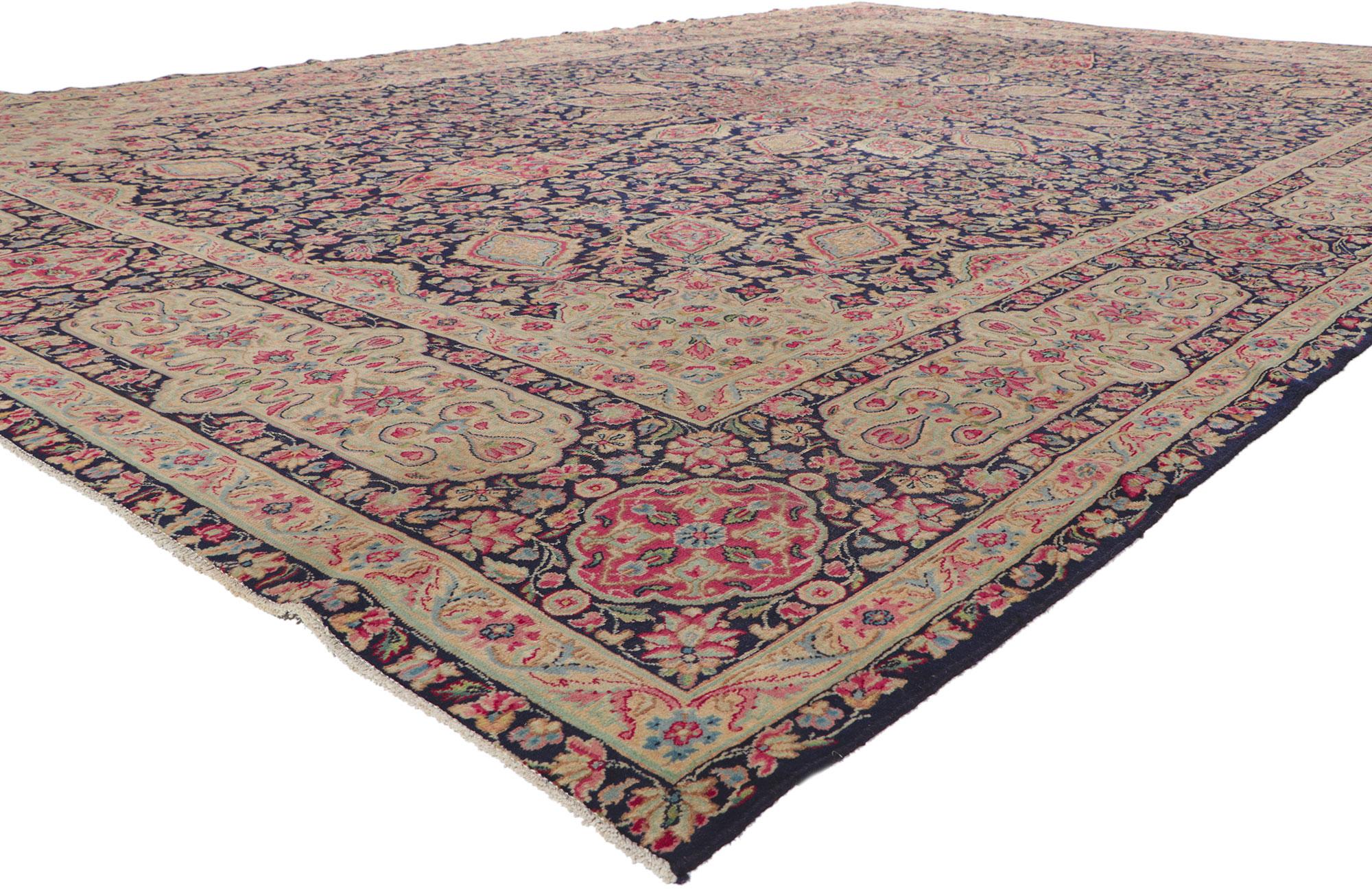 61187 Antique Persian Kerman rug with The Ardabil Carpet 11'02 x 16'09. ?Inspired from the Ardabil carpet from the Safavid dynasty, this hand-knotted wool antique Persian Kerman rug is poised to impress. The abrashed navy blue field features a