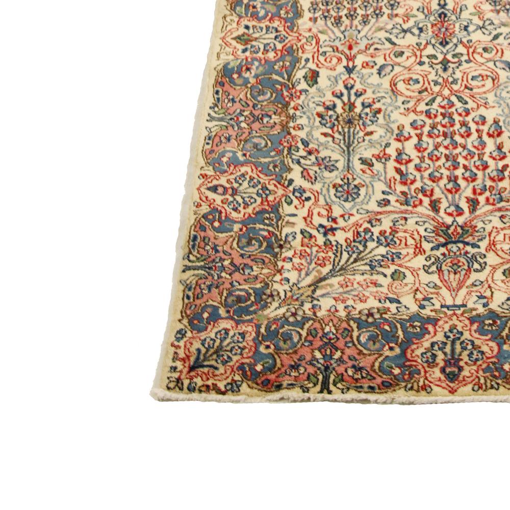 Hand-Woven Antique Persian Kerman Runner Rug with Red & Blue Floral Motifs on Ivory Field For Sale