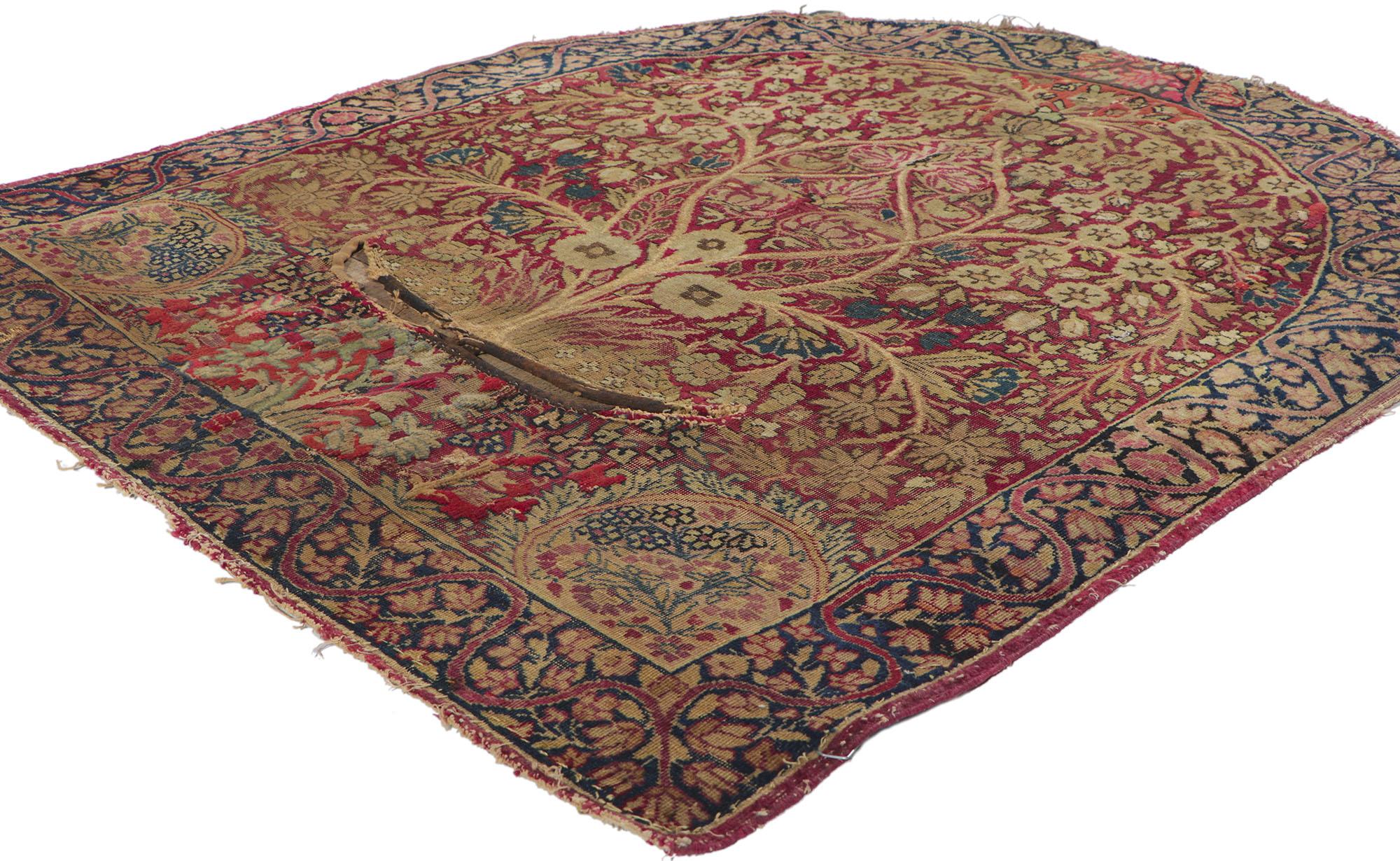 74897 Antique Persian Kerman Rug Saddle Cover, 03'03  X 03'08. Behold this hand-knotted antique Persian Kerman saddle cover, meticulously crafted with a round top and a gracefully curved slit tailored for the back of the saddle. Against a deep