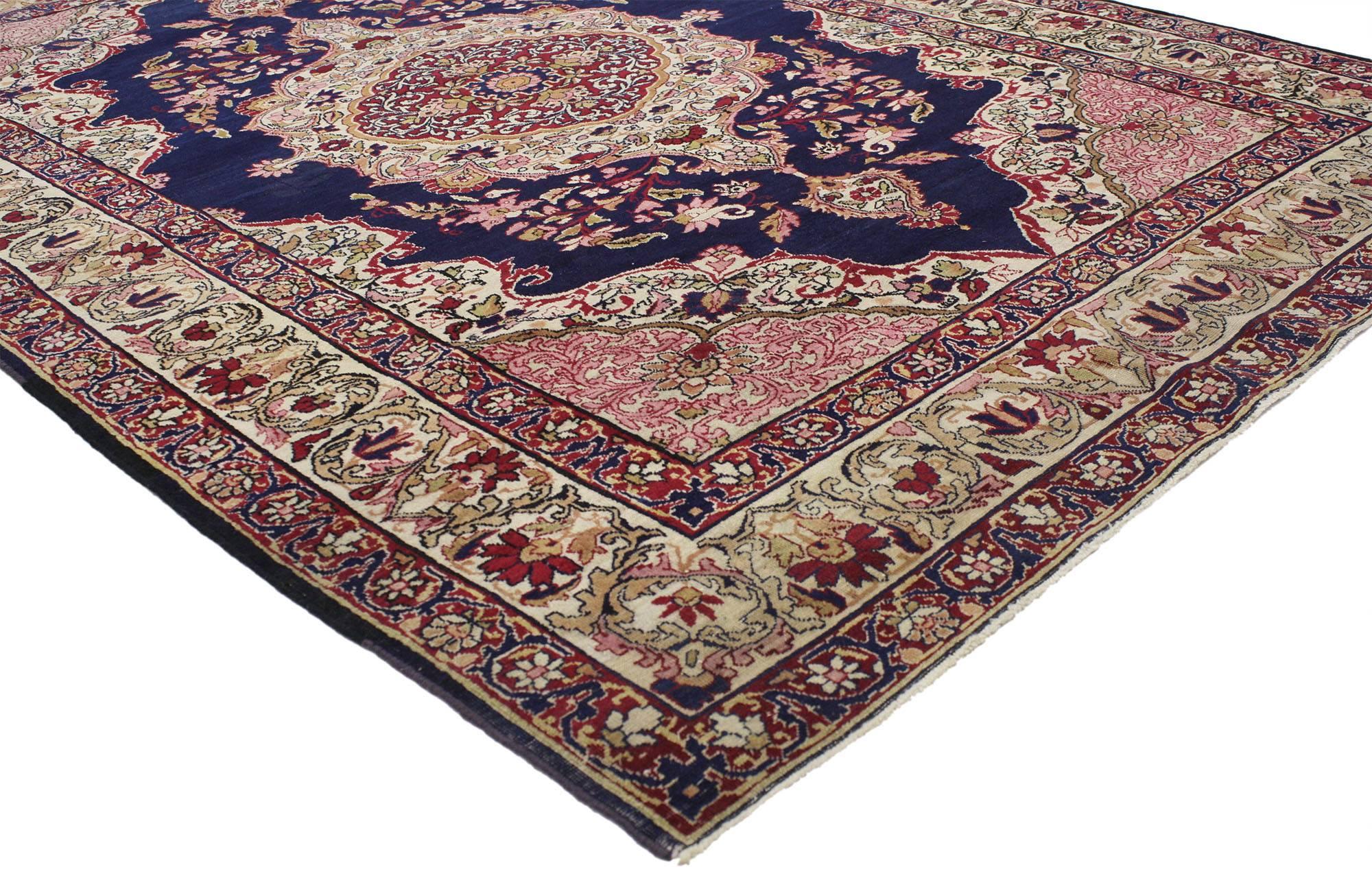 77023 Antique Persian Kermanshah Rug with Traditional Style 04'07 x 06'09. Rich in color with beguiling beauty, this hand knotted wool antique Persian Kermanshah rug is poised to impress. It features a central curvilinear floral medallion on a sea