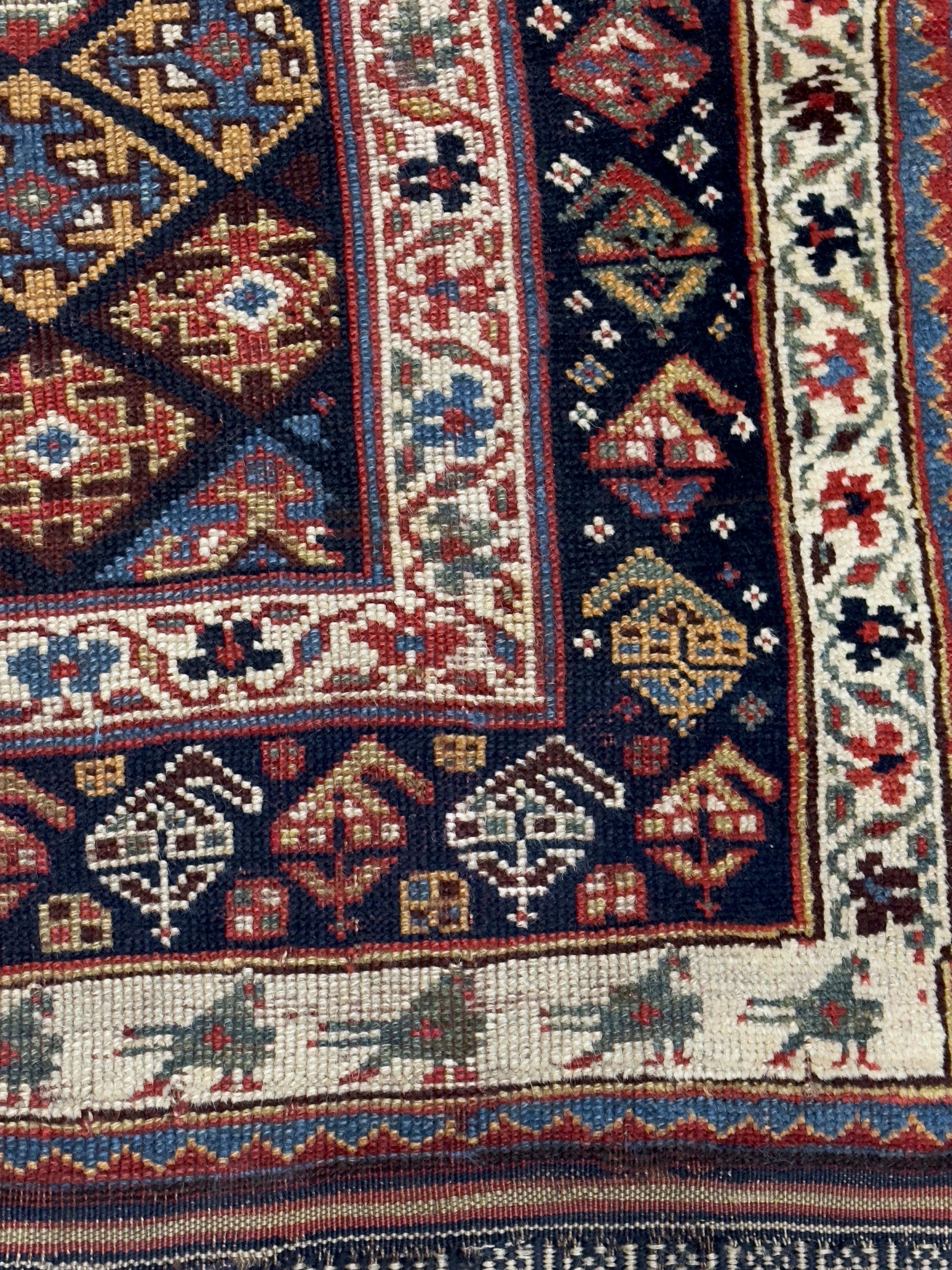 Antiker persischer Khamseh-Teppich 4'9