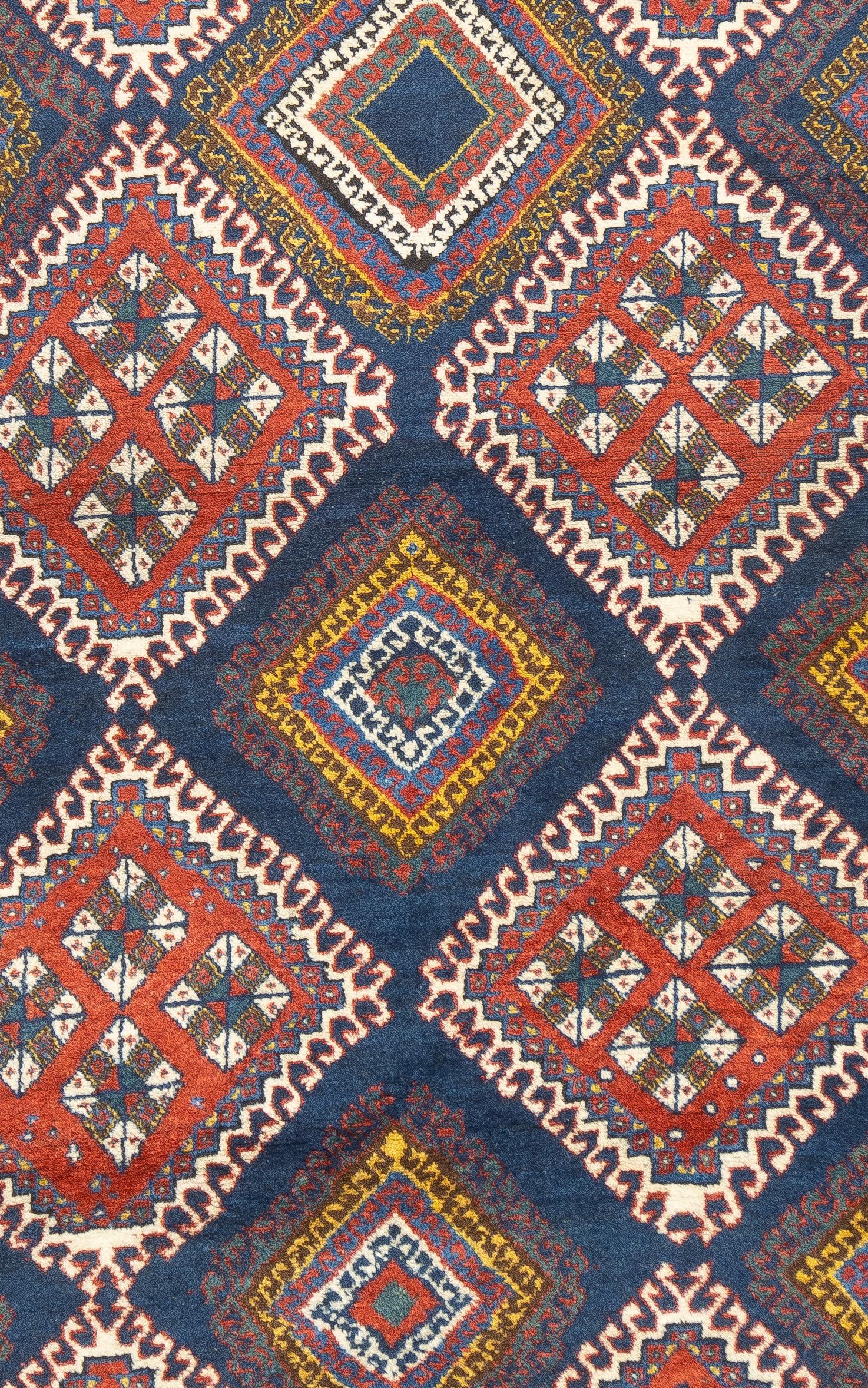 Antiker persischer Khamseh-Teppich 5'0