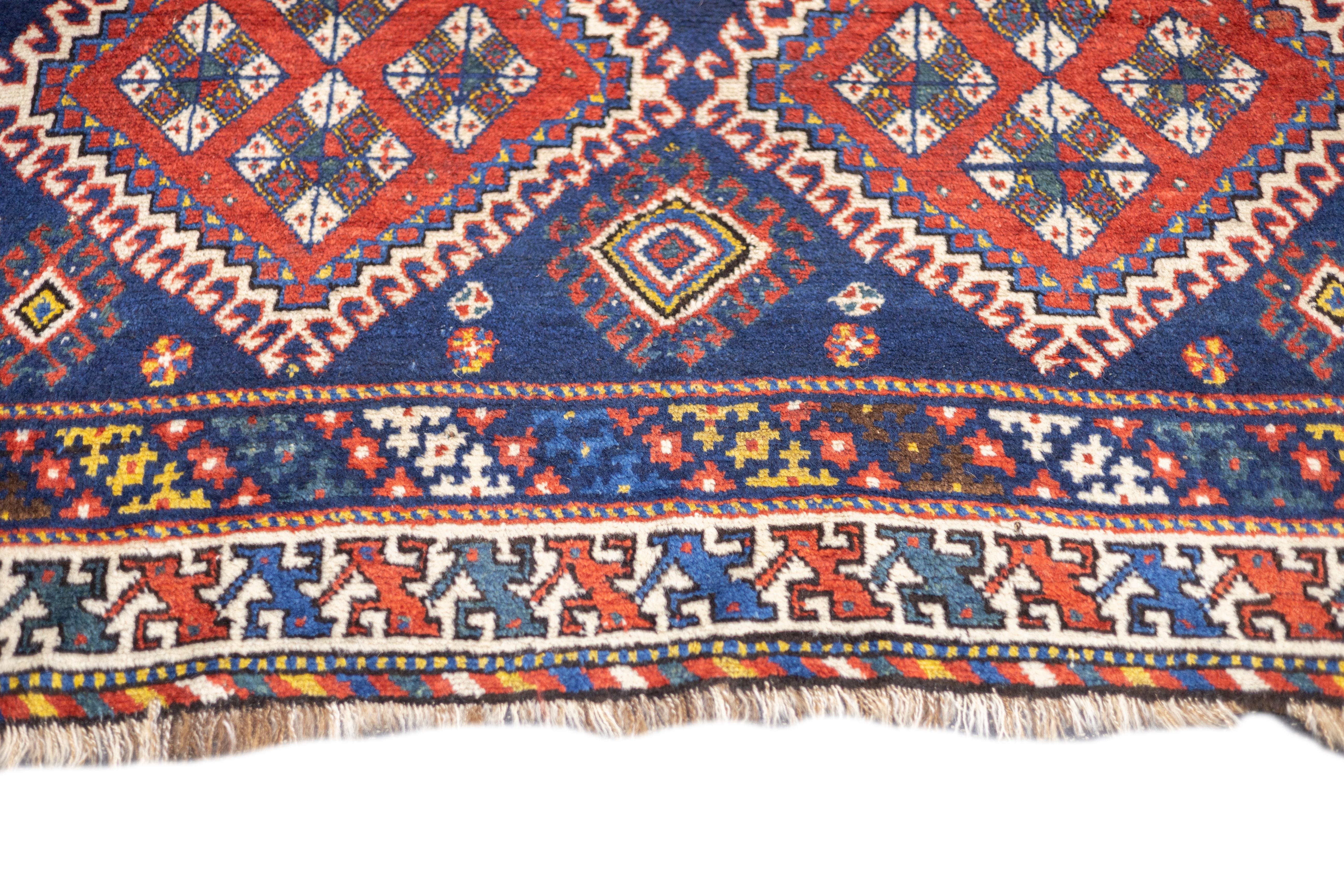 Antiker persischer Khamseh-Teppich 5'0