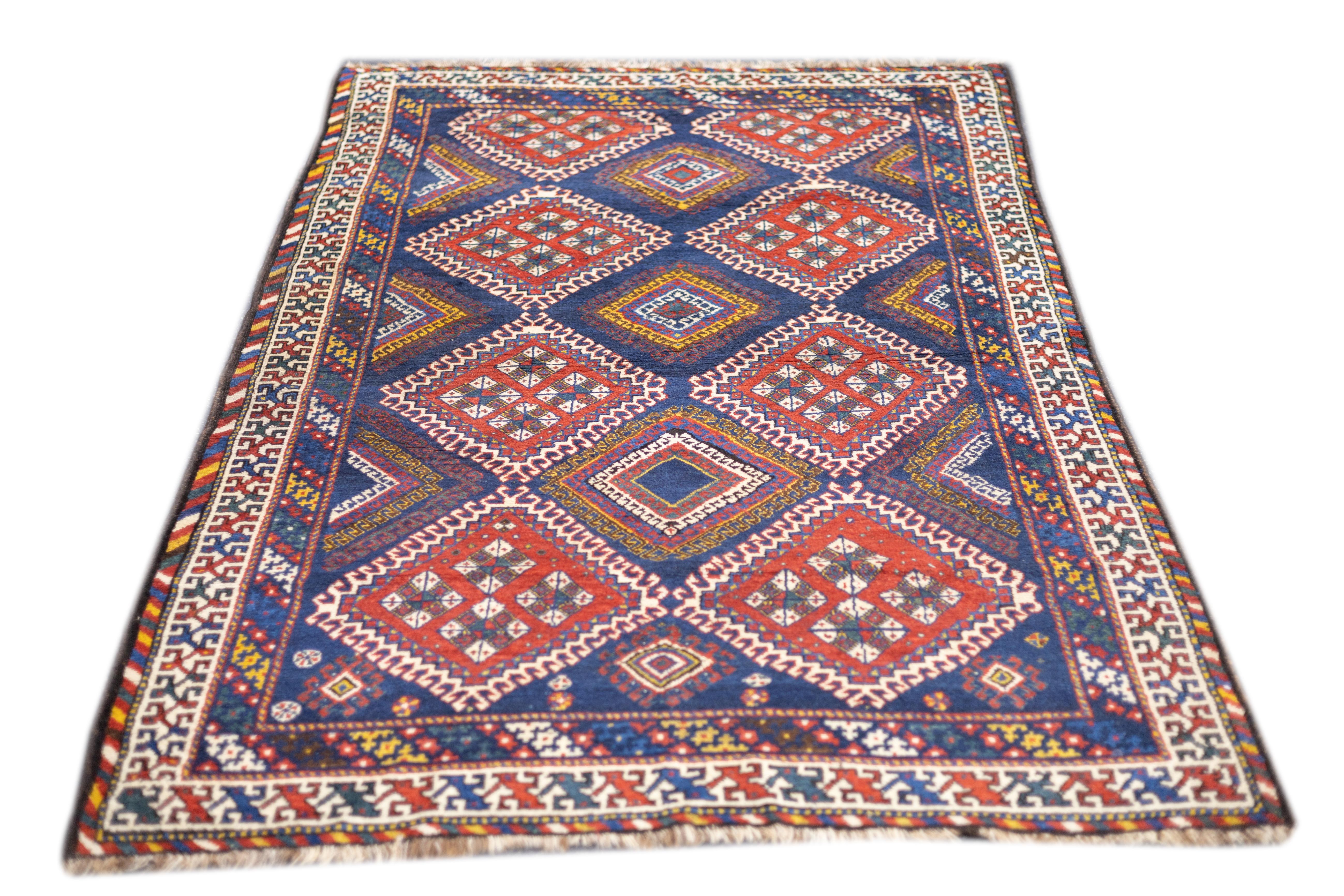 Antiker persischer Khamseh-Teppich 5'0