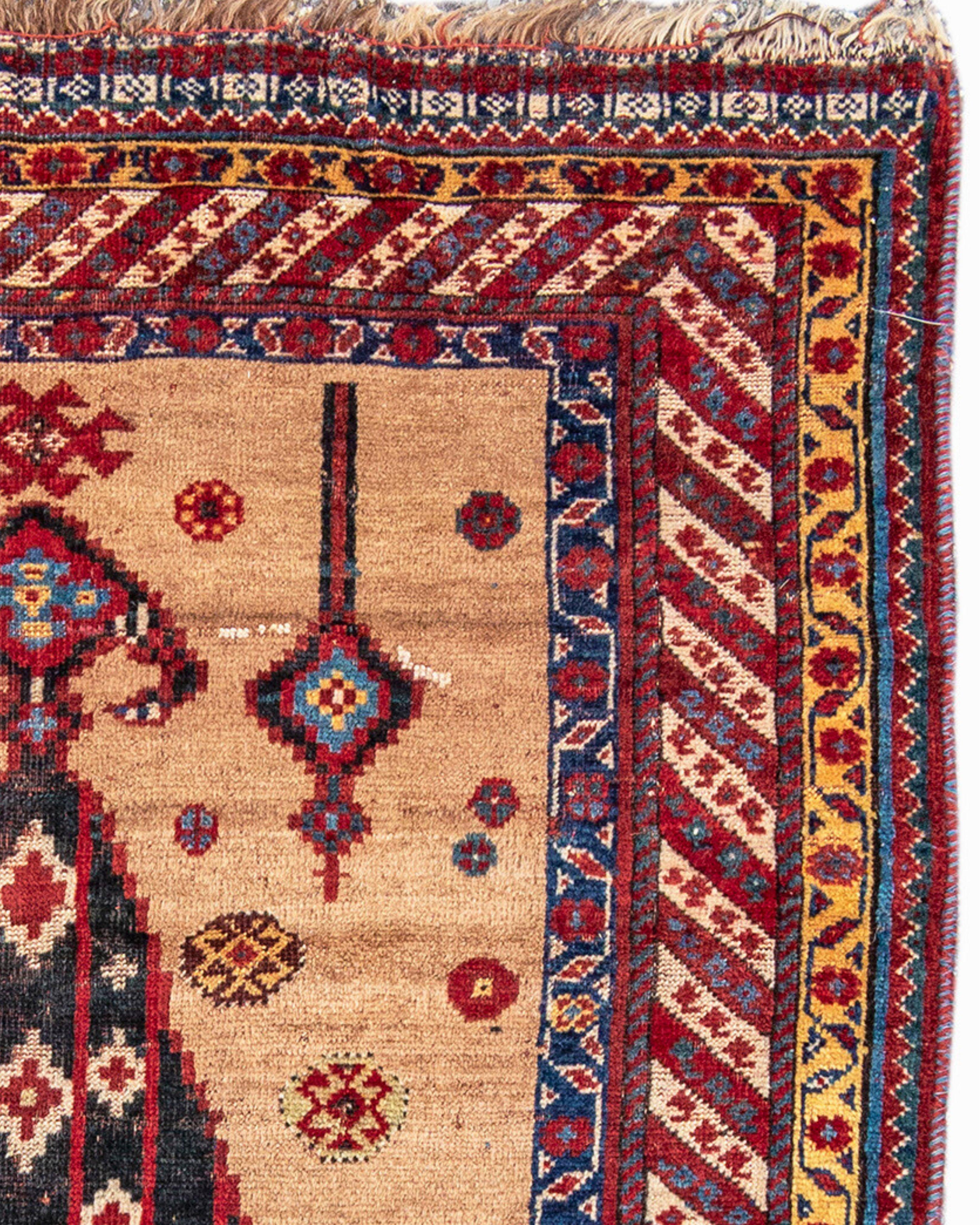 Antique Persian Khamseh Small Rug, Late 19th Century

Ostensibly, for a rug woven by one of the constituent tribes of the Khamseh Confederacy, this design is rare, if not unique. Woven with a camel wool ground (a rare feature), the field pattern