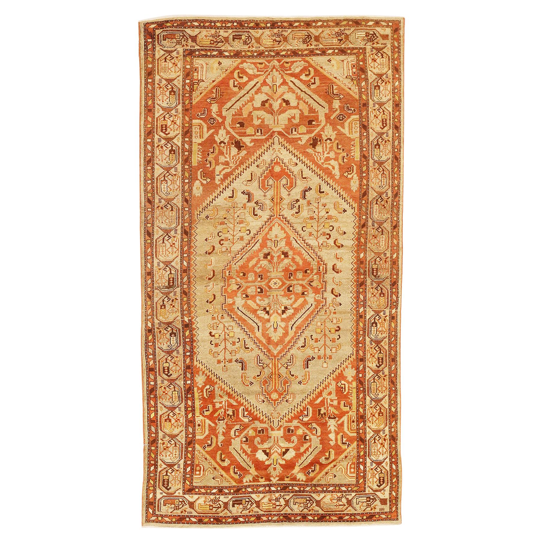 Antique Persian Khamseh Rug with Brown and Ivory Tribal Details on Orange Field