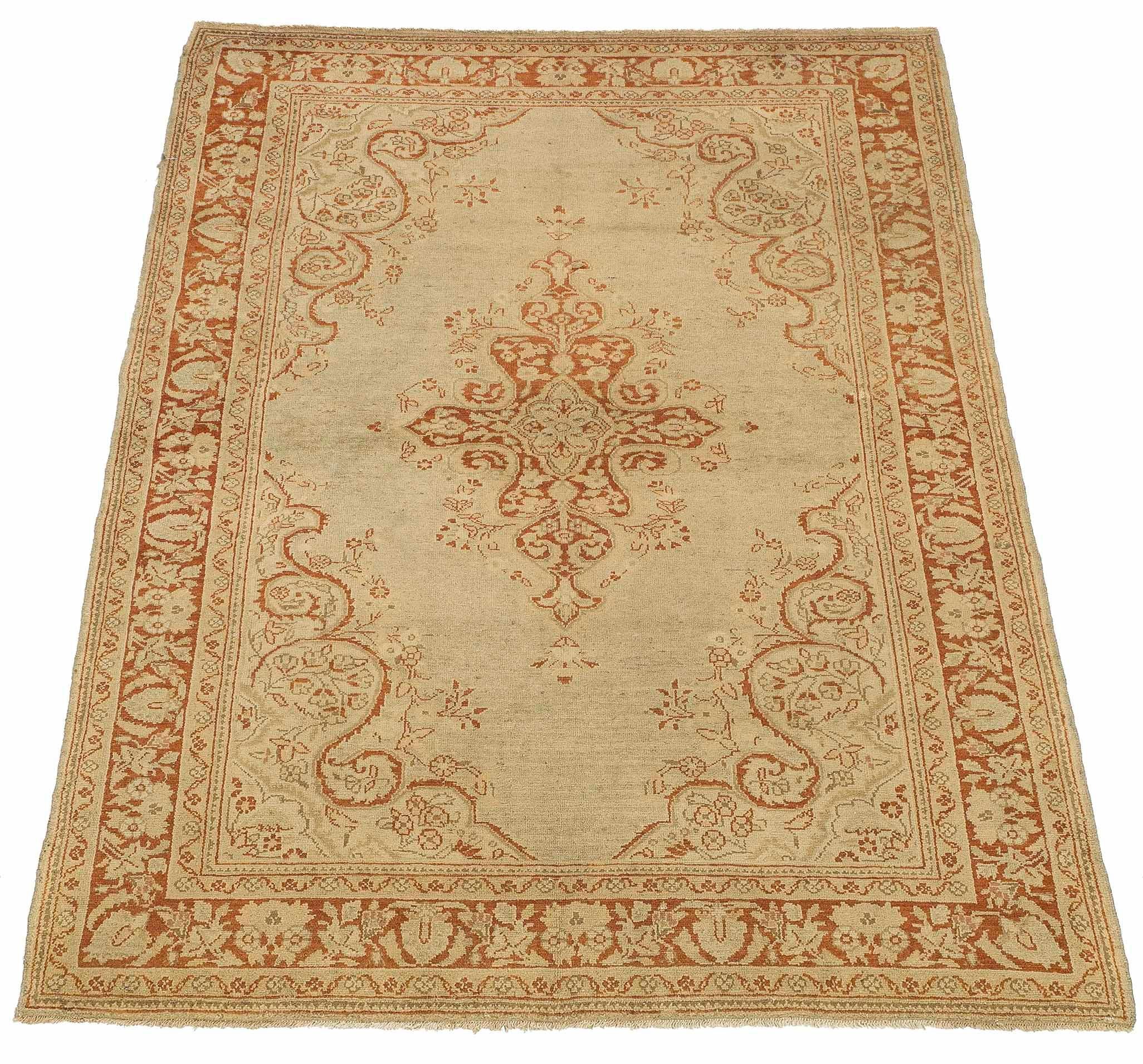 Antique Persian rug handwoven from the finest sheep’s wool and colored with all-natural vegetable dyes that are safe for humans and pets. It’s a traditional Khamseh design featuring a gorgeous mix of pink, beige, and ivory tribal details on a brown