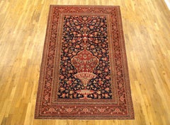 Antique Persian Khorason Oriental Rug in Small Size with Vase Design