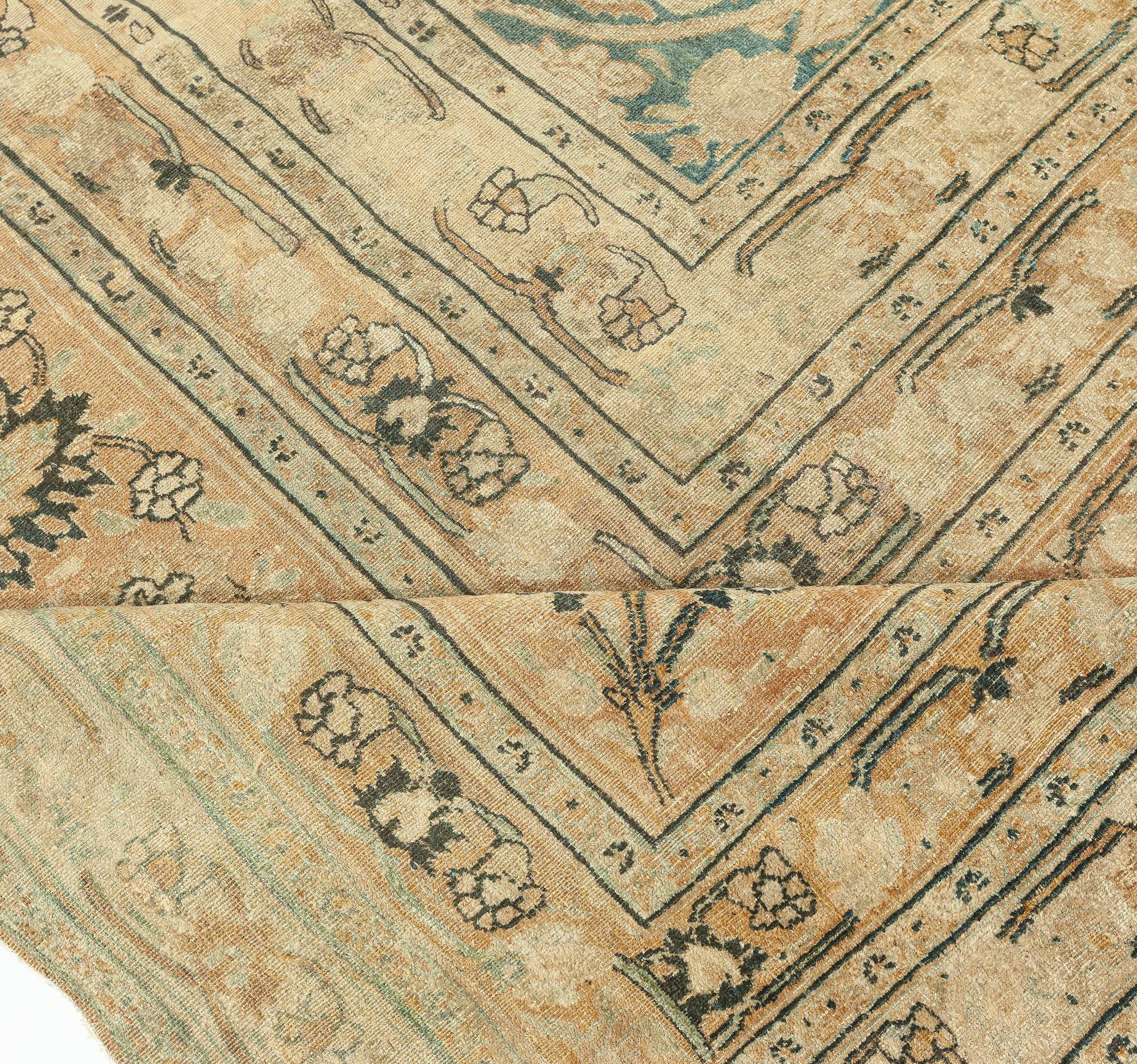 Antique Persian Khorassan rug
Size: 13'3