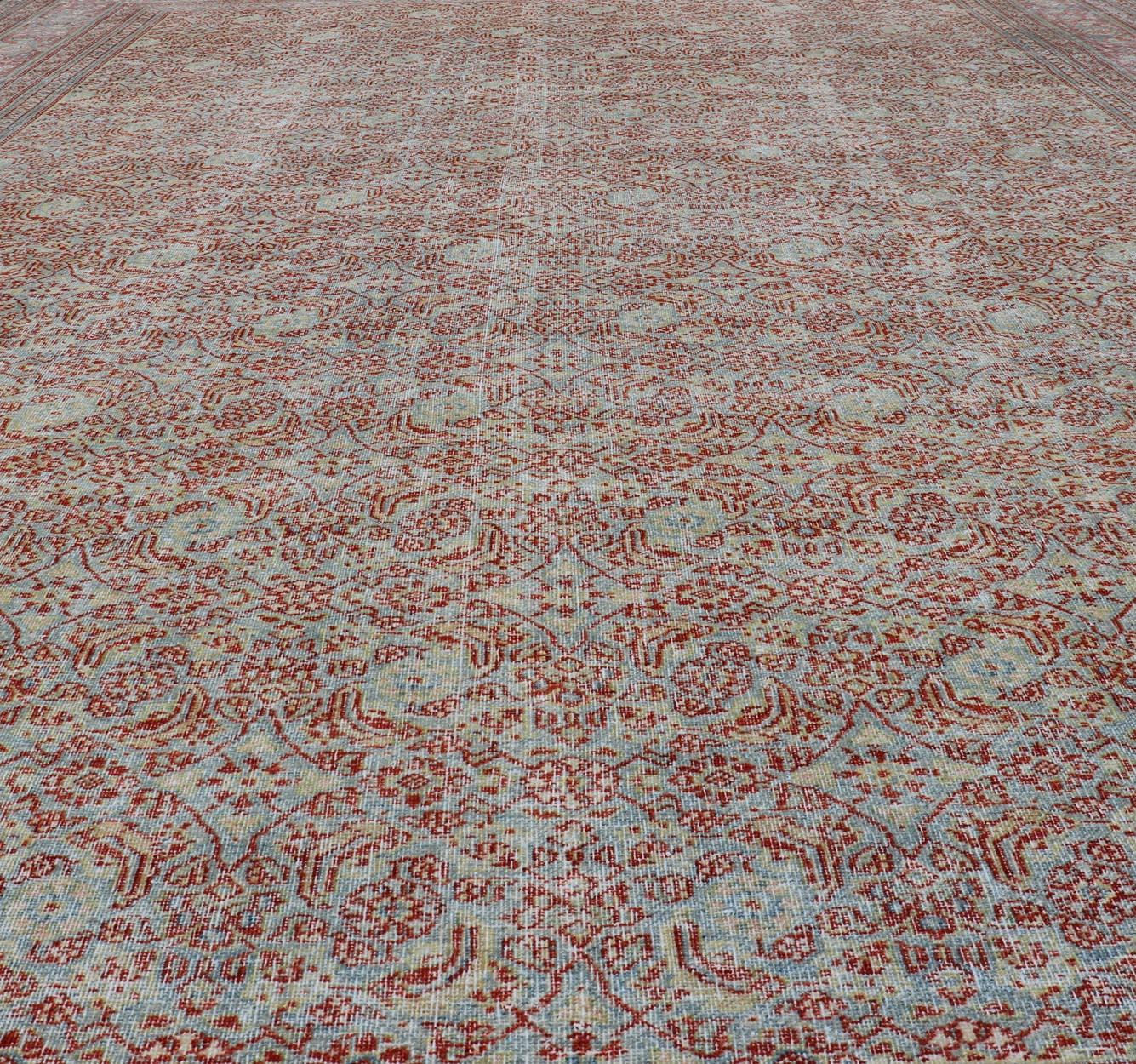 20th Century Antique Persian Khorassan Rug with All-Over Floral Design in Red and Blue For Sale