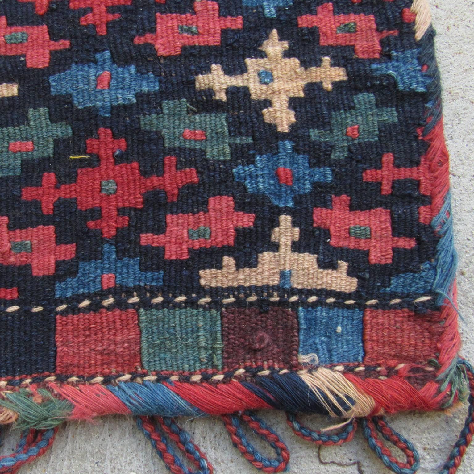 Late 19th century Kilim bagface. Great condition and color.
Measures: 20 x 21 inches.