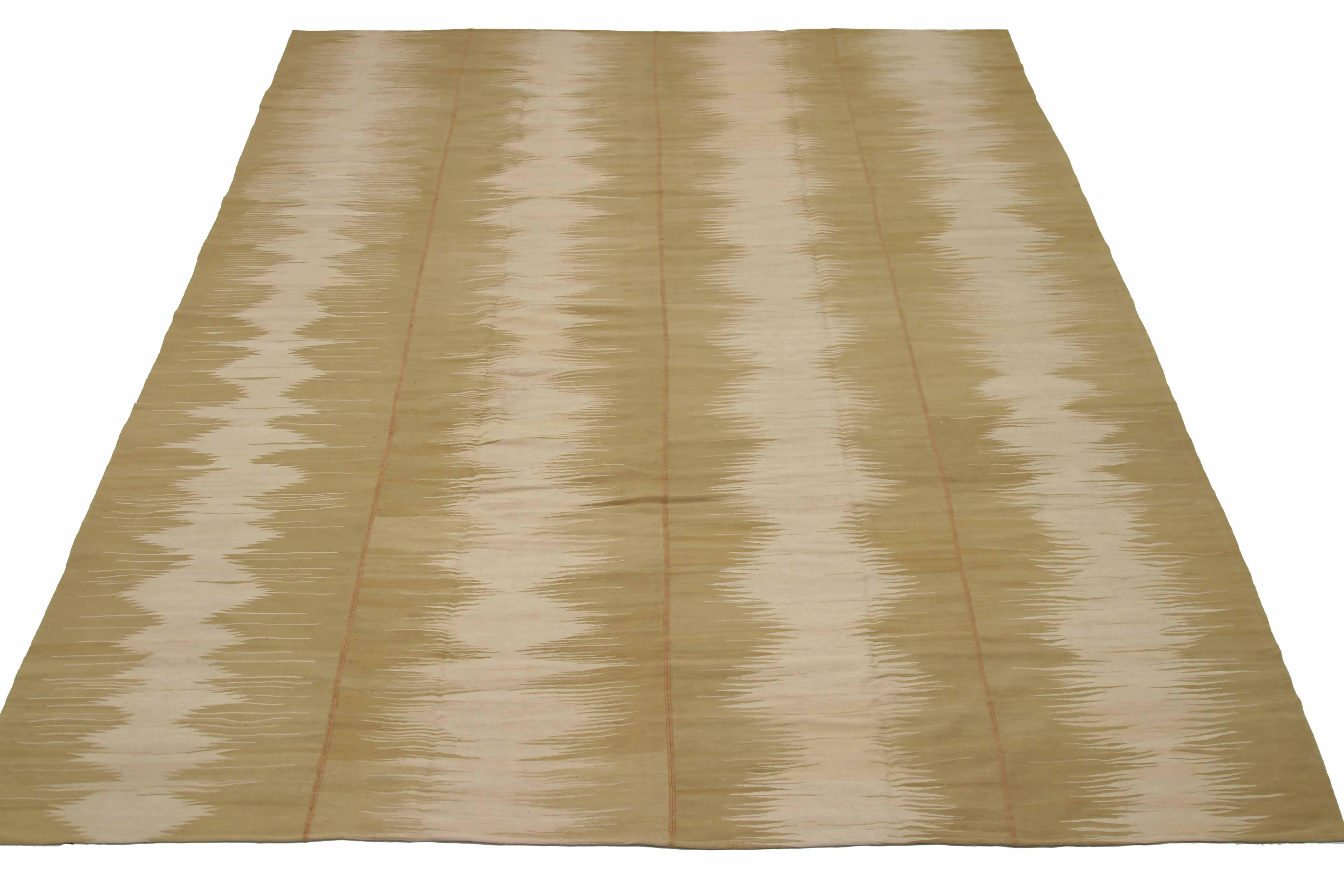 Antique handmade Persian area rug from high quality sheep’s wool and colored with eco-friendly vegetable dyes that are proven safe for humans and pets alike. It’s a Classic Kilim design showcasing a sound wave pattern on a brown field. It’s a lovely