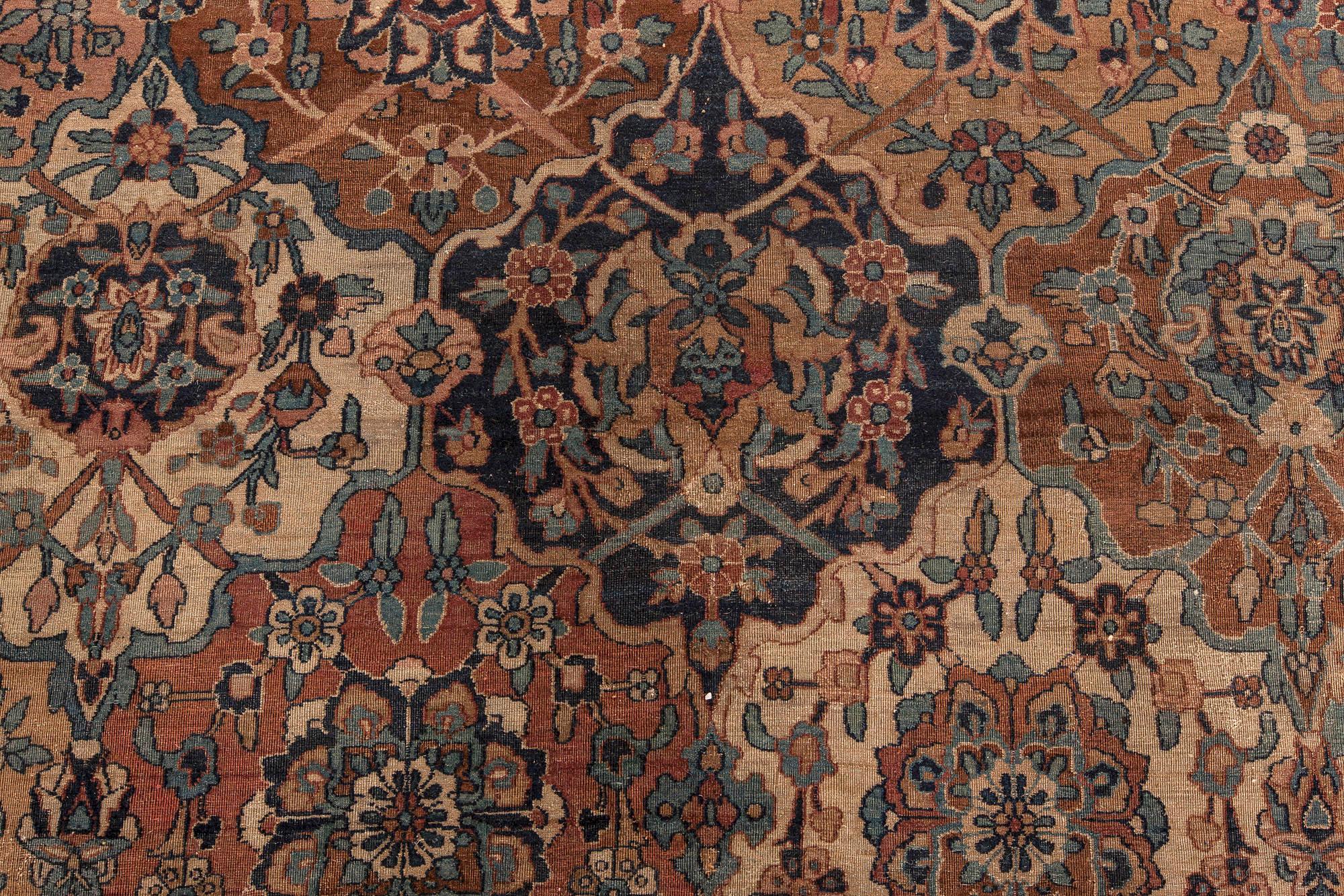 Antique Persian Kirman Botanic handmade wool rug
Size: 17'3