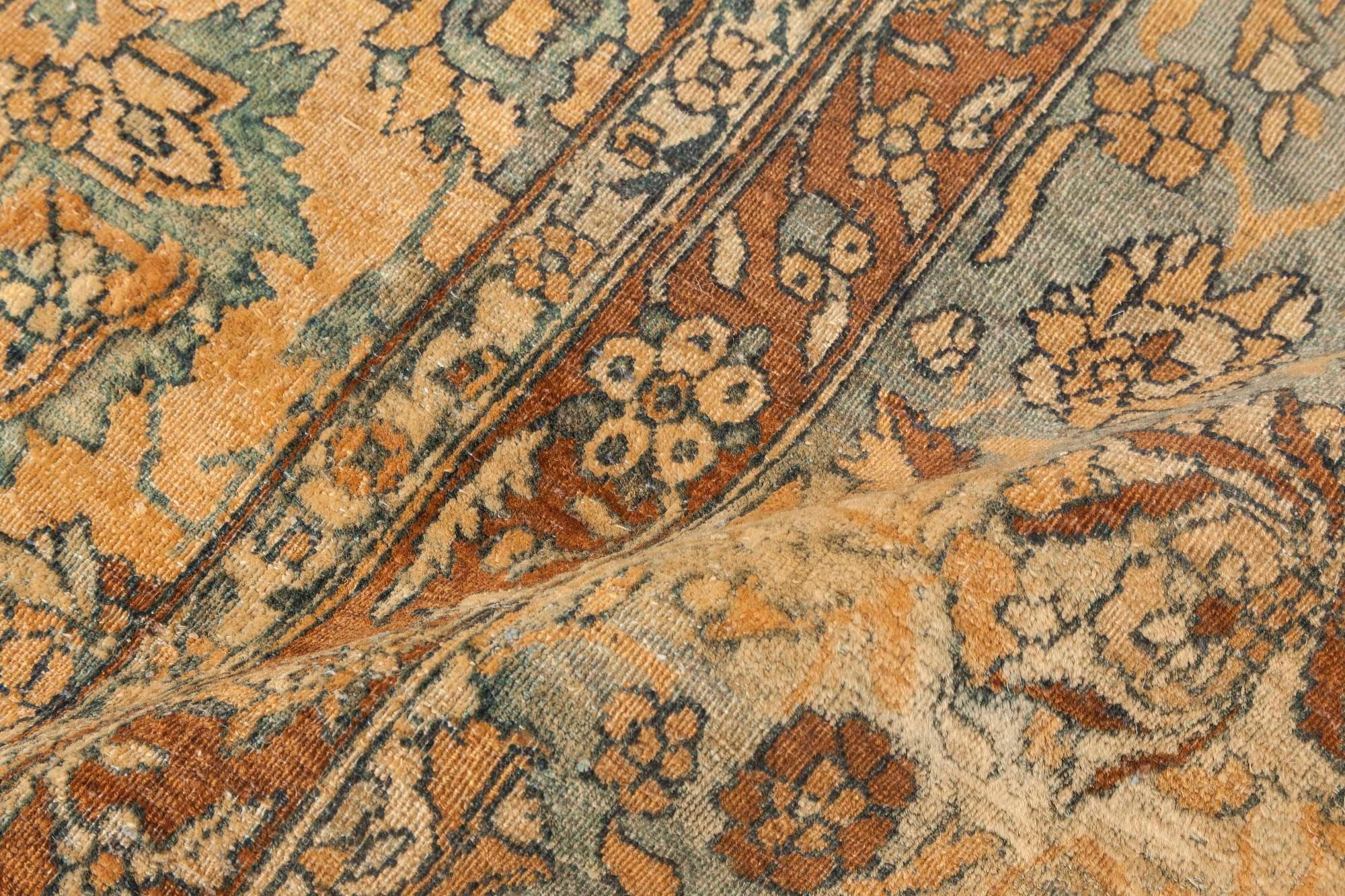 Antique Persian Kirman Botanic Handmade Wool Rug
Size: 13'6