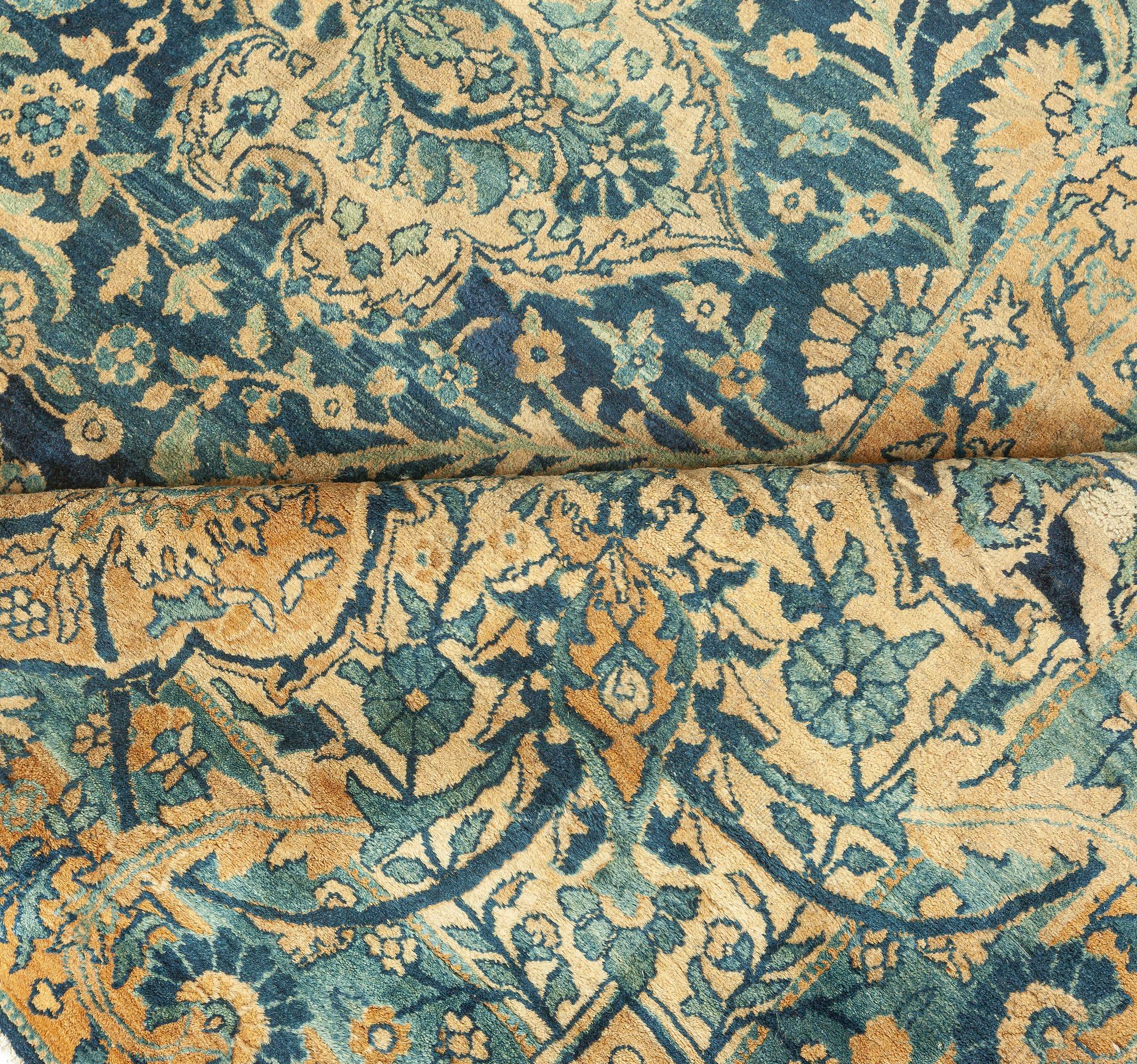 Antique Persian Kirman botanic navy blue background rug (size adjusted)
Size: 12'8