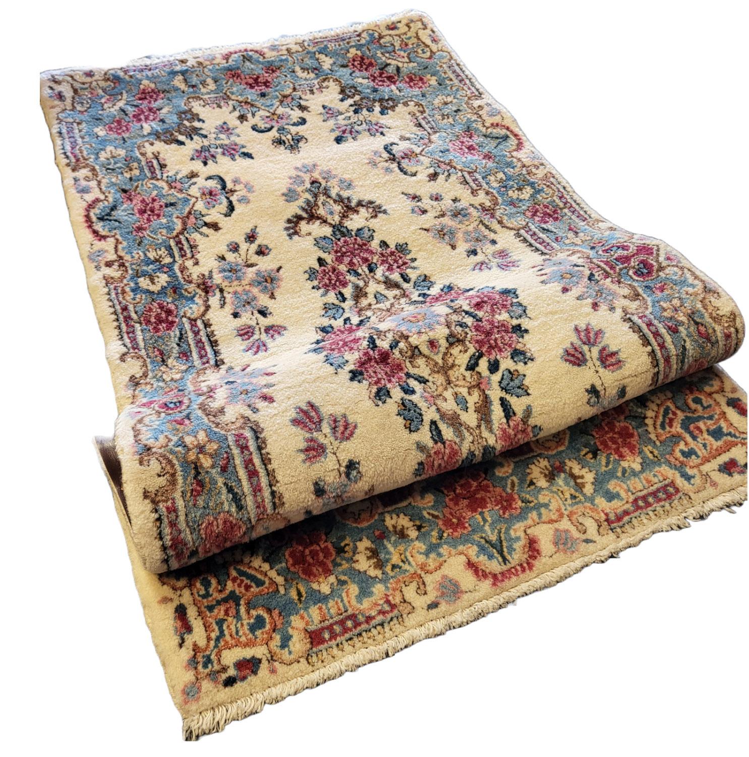 Gorgeous authentic, antique Kirman:

Made of finely woven Persian wool, resulting in an incredibly plush and soft pile.

Beautiful design with an excellent soft color pallet.

This antique is in superb condition, a reflection of it's excellent