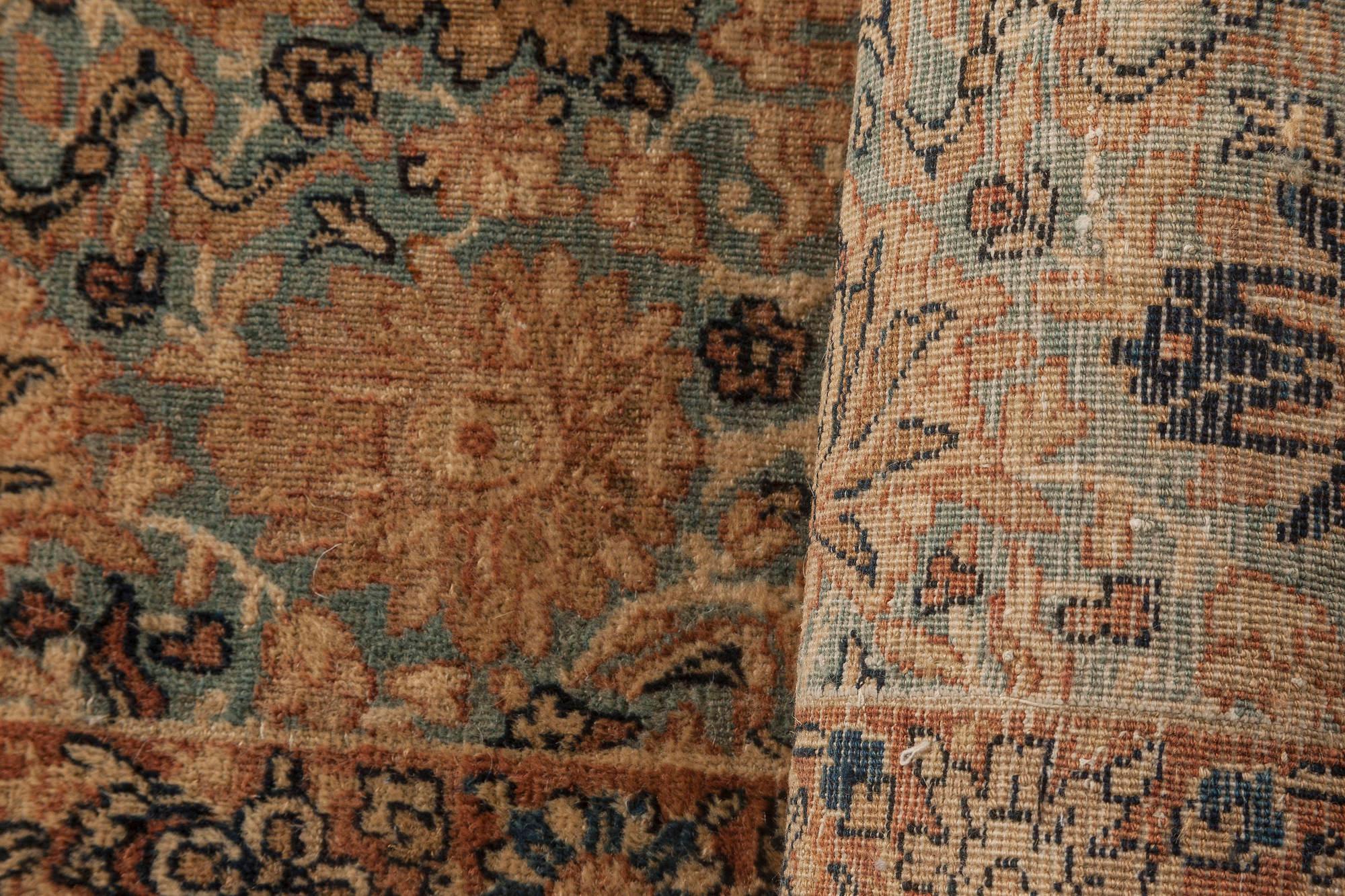 Hand-Woven Antique Persian Kirman Handwoven Wool Rug For Sale