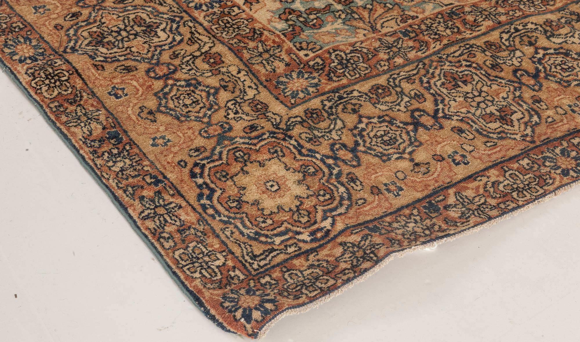 20th Century Antique Persian Kirman Handwoven Wool Rug For Sale