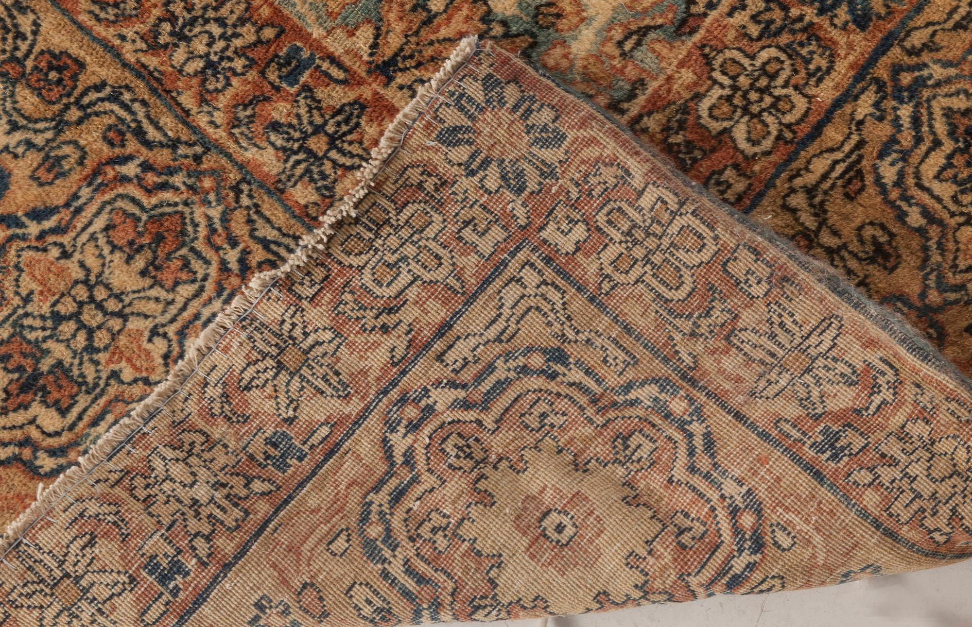 Antique Persian Kirman Handwoven Wool Rug For Sale 1