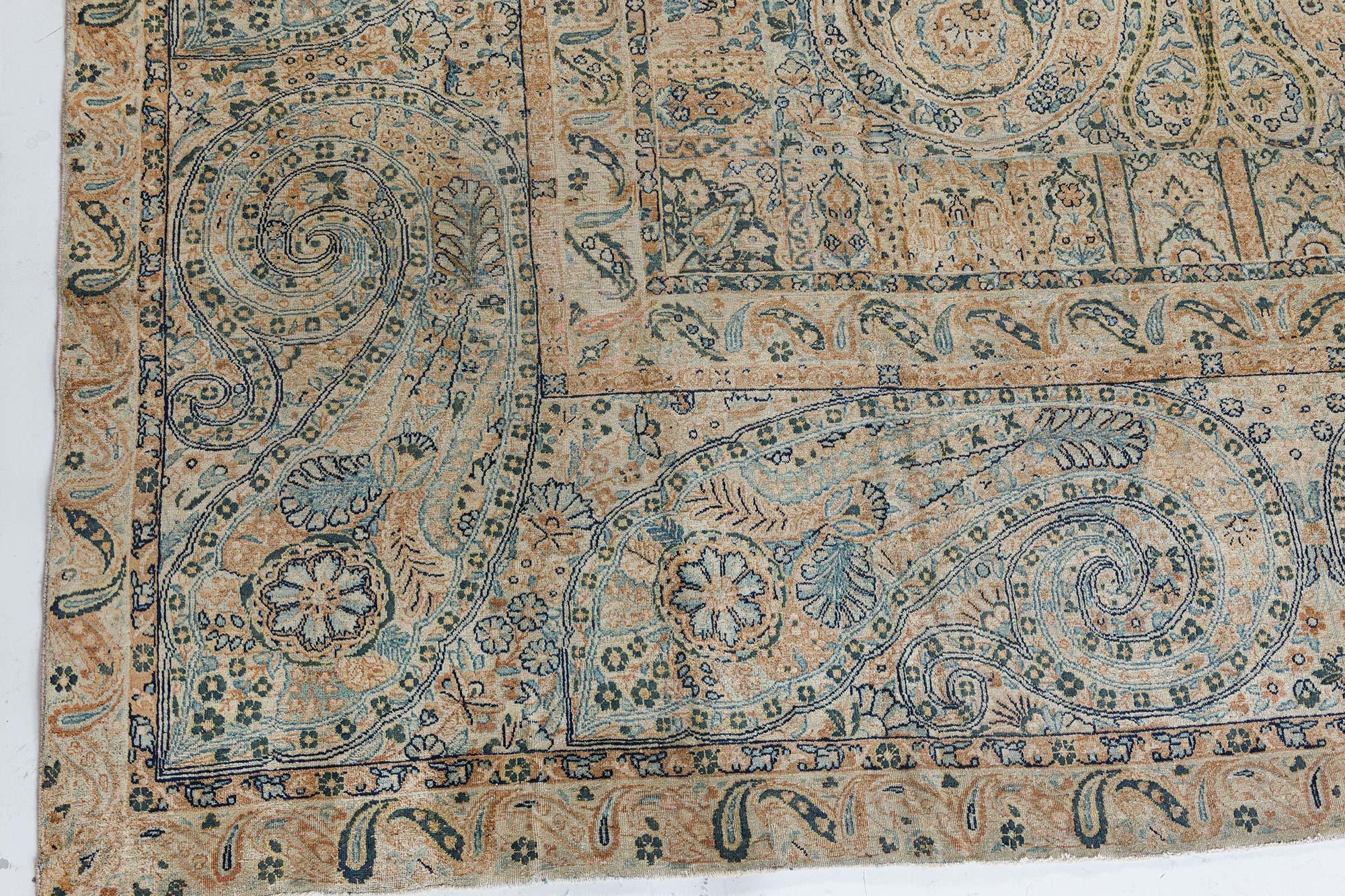 Antique Persian Kirman blue, green, beige handmade wool rug
Size: 10'4