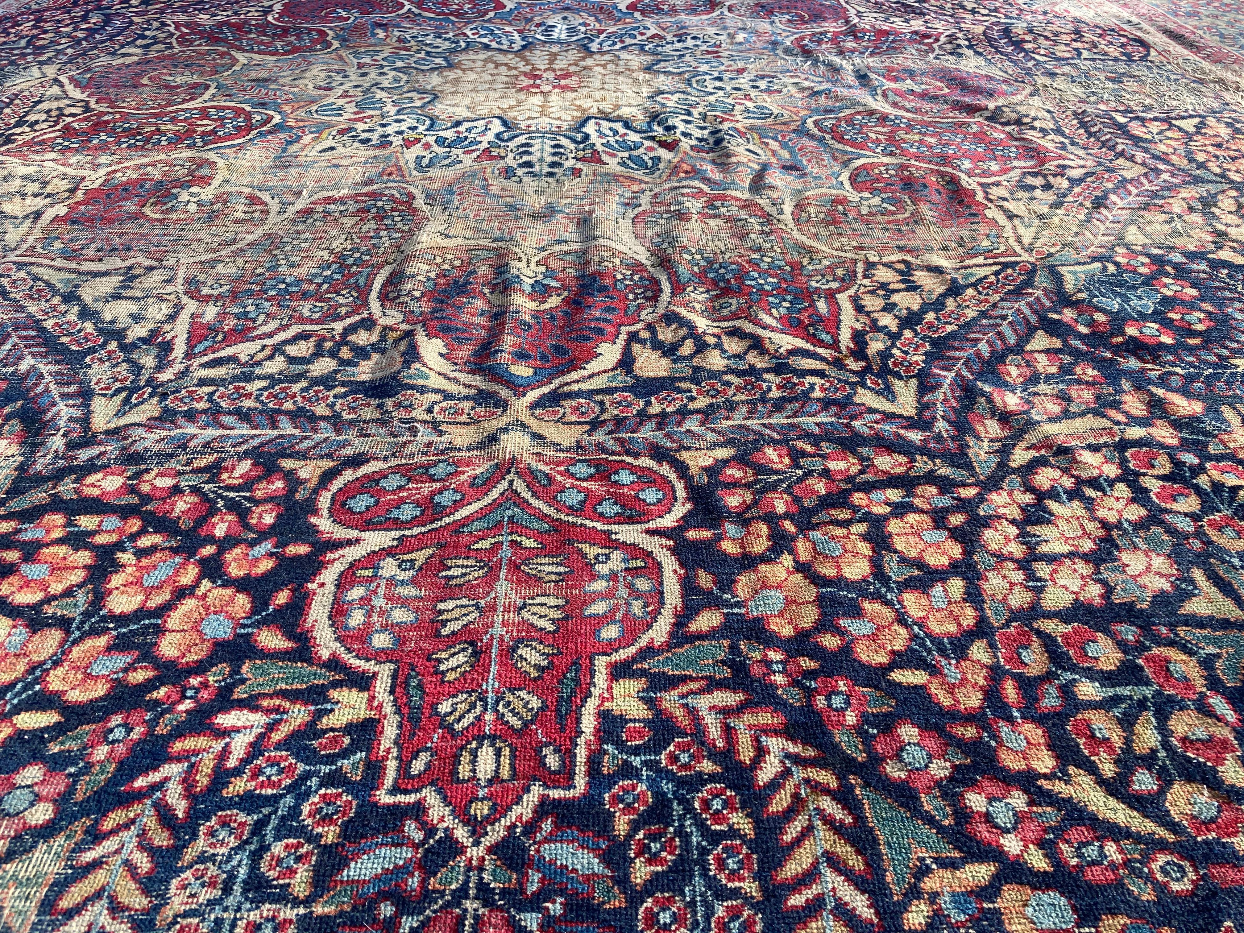 Antique Persian Kirman Rug In Distressed Condition For Sale In RÉDING, FR