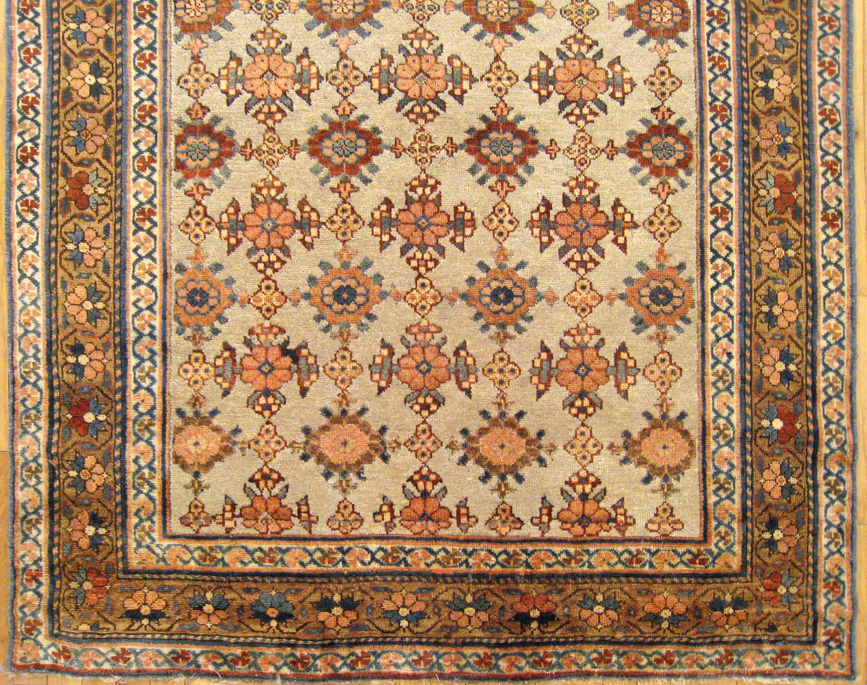 Antique Persian Kurd Rug, Gallery Size, Repeating Rosettes in Soft Tones In Good Condition For Sale In New York, NY