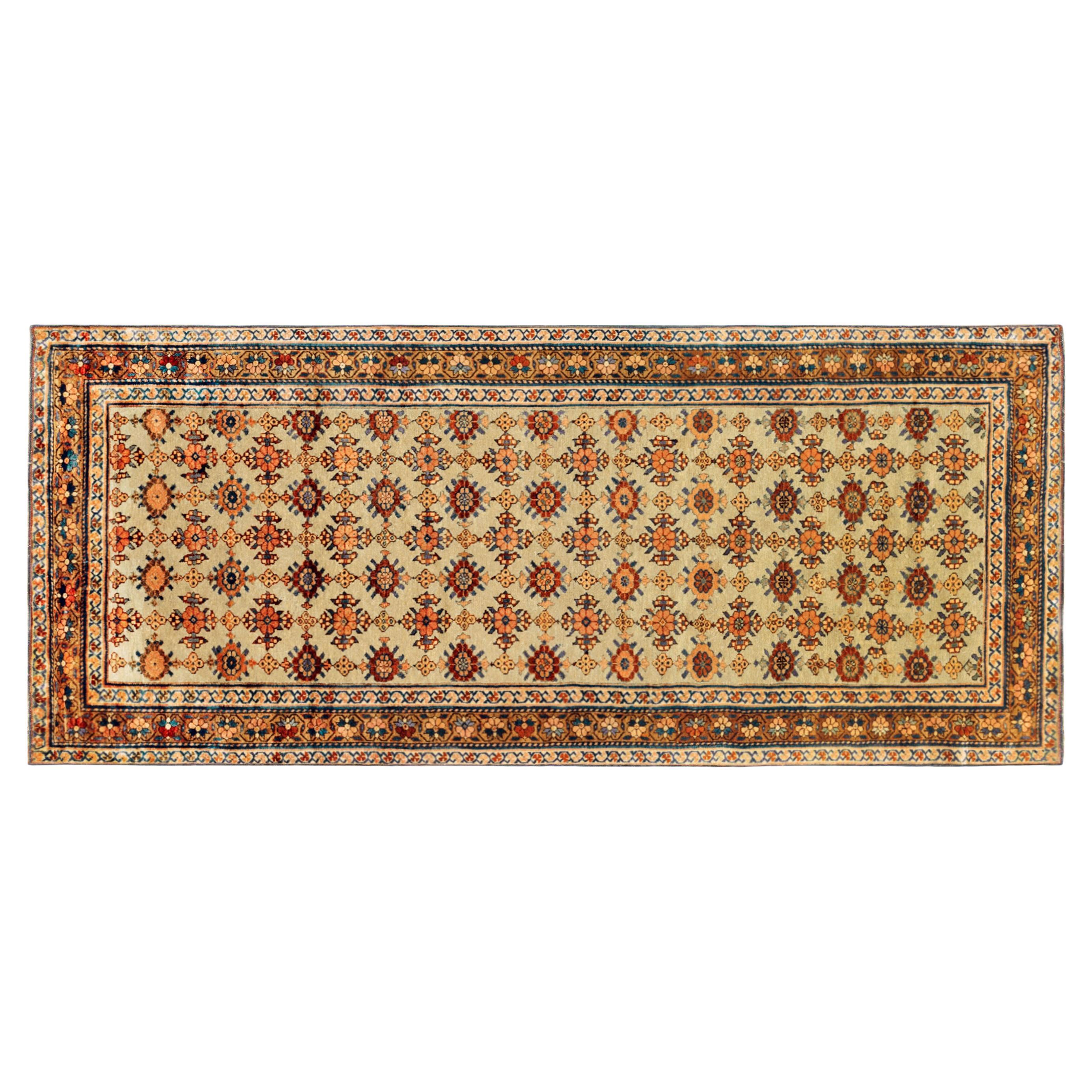 Antique Persian Kurd Rug, Gallery Size, Repeating Rosettes in Soft Tones For Sale