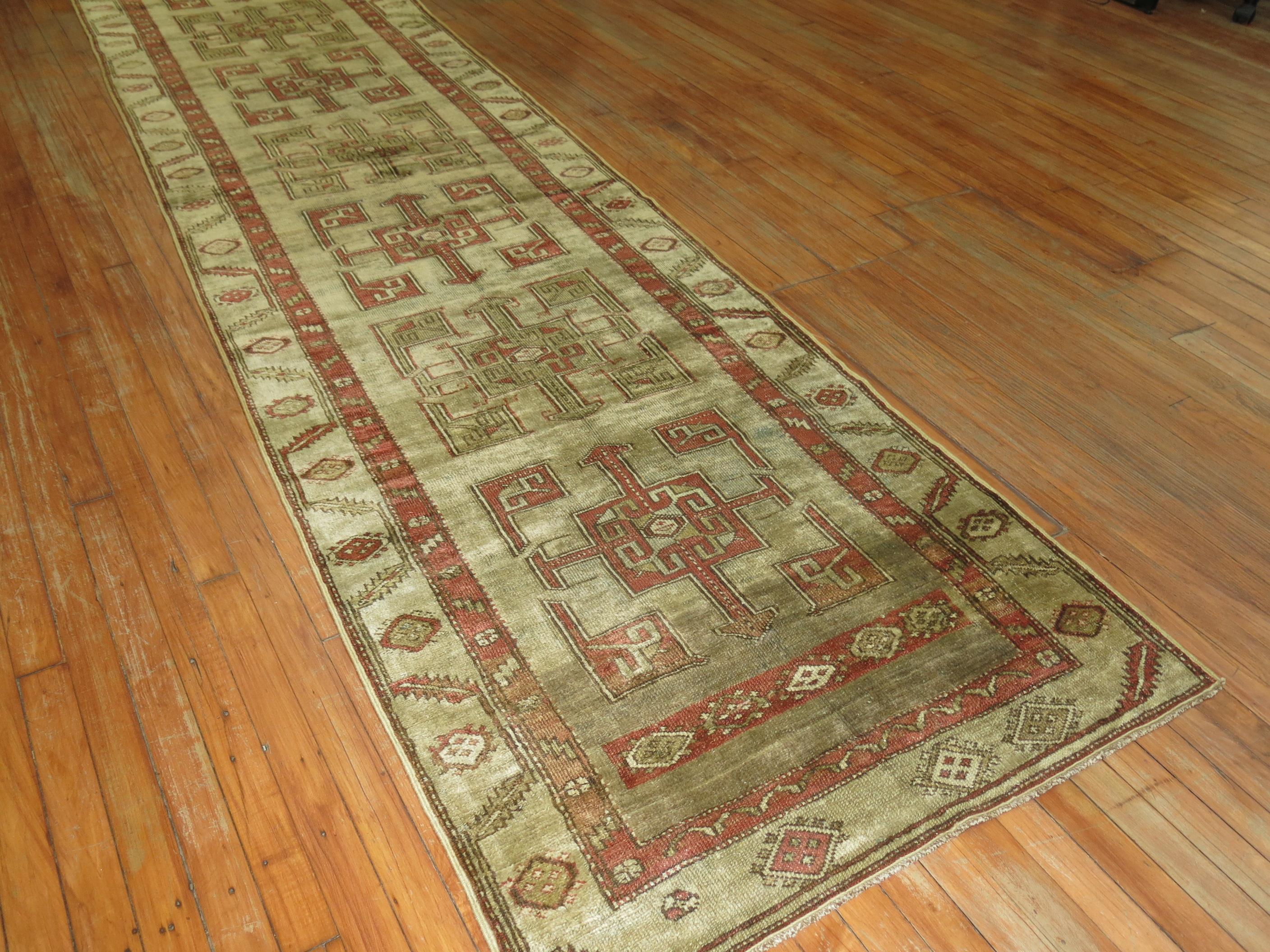 Early 20th century Persian Malayer Kurd runner with Tribal elements that derive from 19th century Persian Bakshaish rugs.

Measures: 3'2'' x 12'9.

