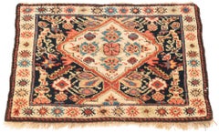 Antique Persian Kurdish Bagface with Navy, Orange and Cream Colored Wool
