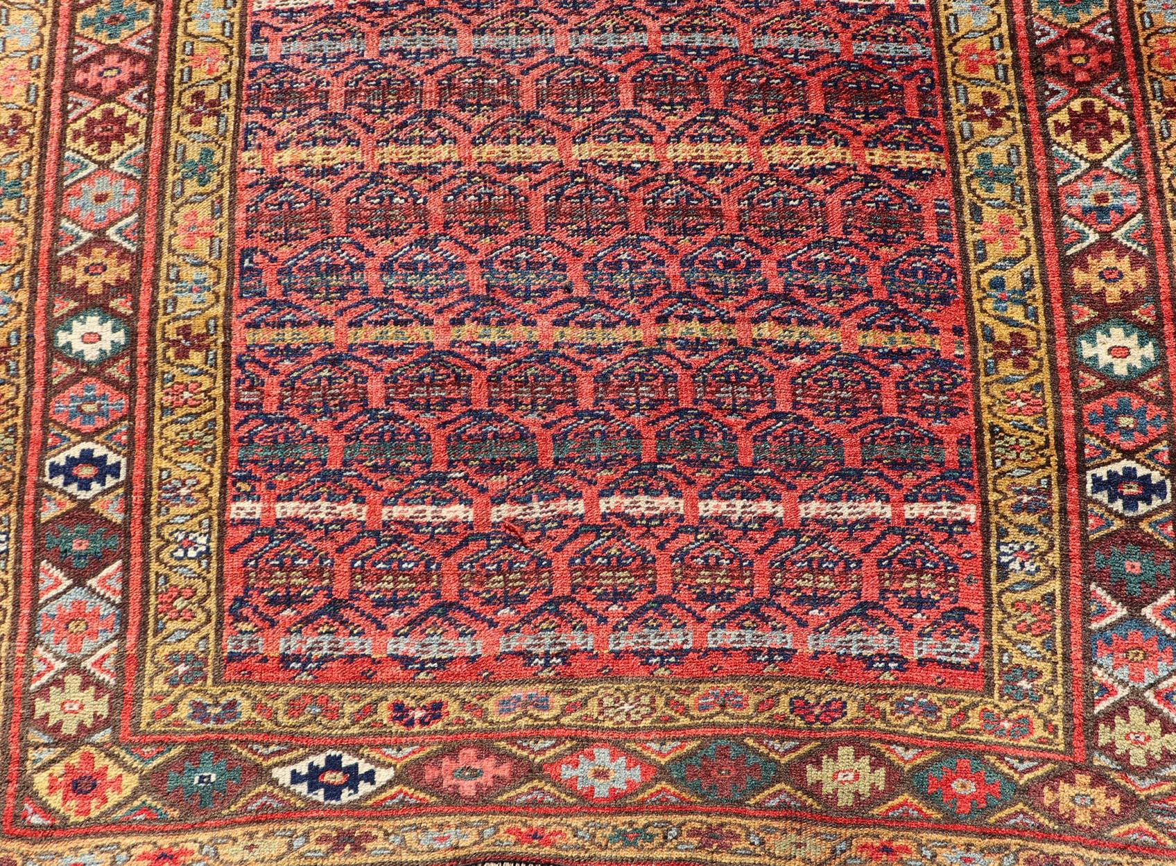 Antique Persian Kurdish Bidjar gallery rug with all-over sub-geometric design. Antique Bidjar wide Runner Keivan Woven Arts; rug W22-1206; country of origin / type: Persian / Bidjar, circa 1900.

Measures: 4'4 x 10'1 

This antique hand-knotted