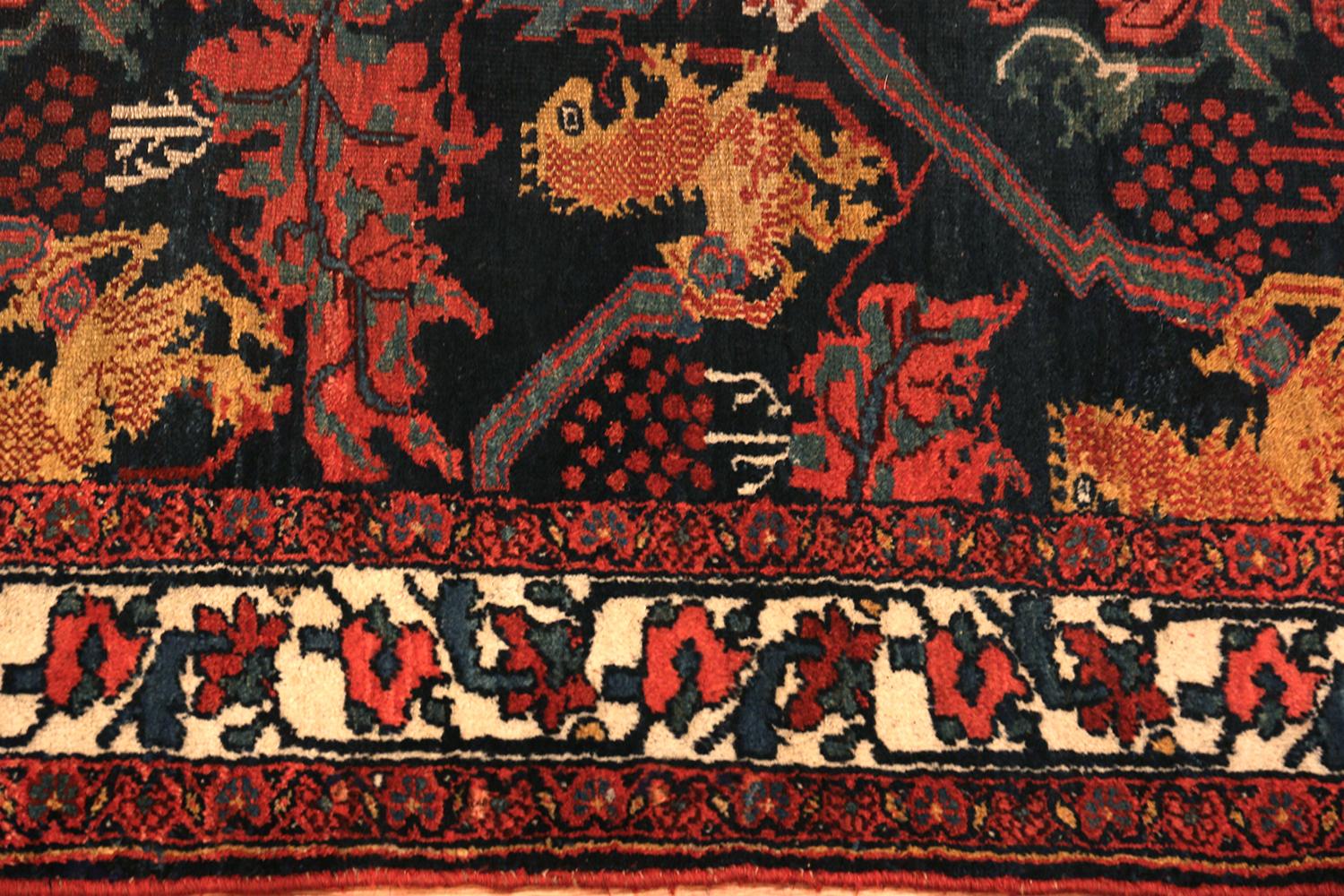 Beautiful antique Kurdish runner rug, country of origin / rug type: Persian rugs, circa 1900 - Size: 3 ft 7 in x 16 ft 2 in (1.09 m x 4.93 m). 

The rugs of the Kurdish people of Bidjar are known for their vibrant colors and range of traditional