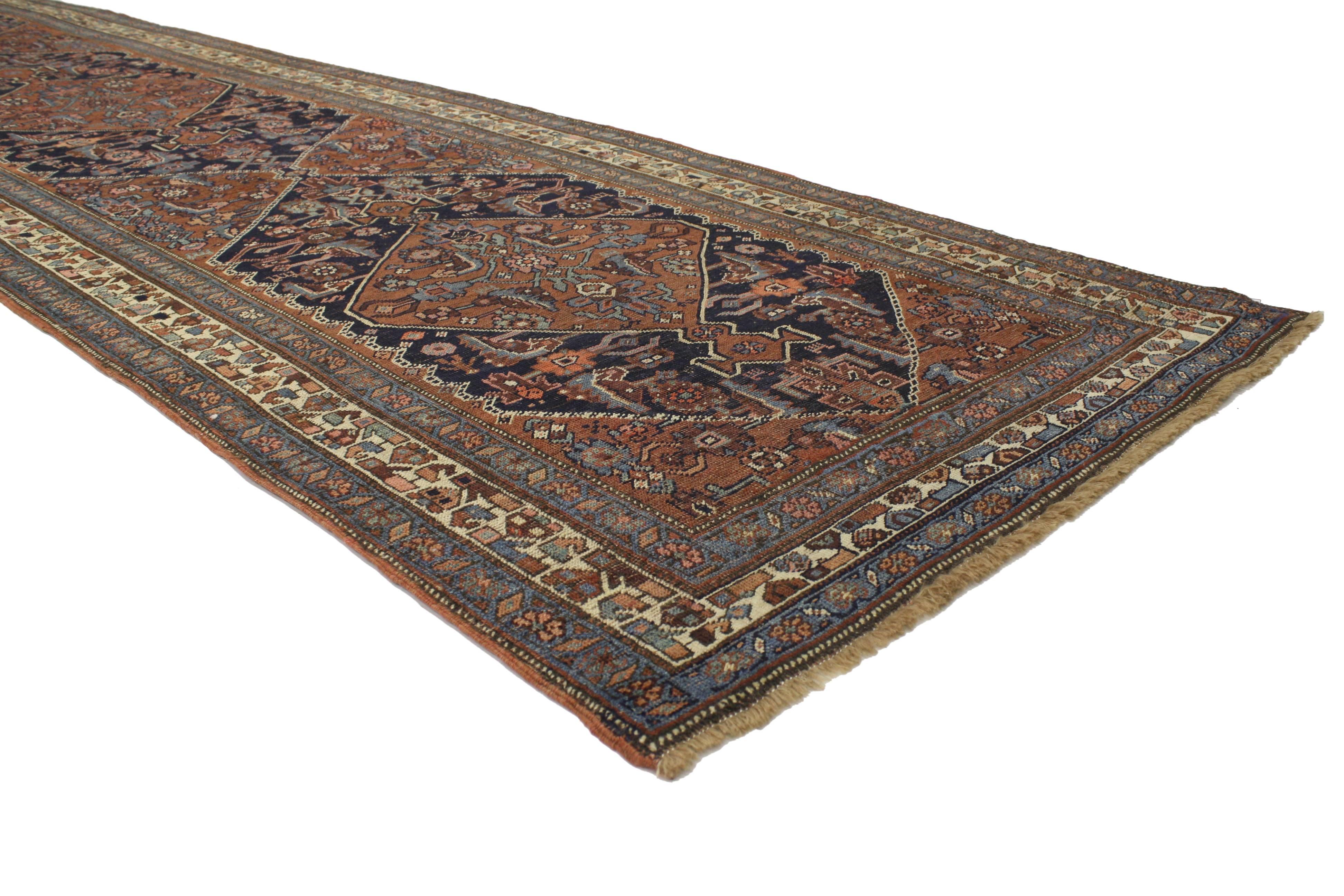 76653 antique Persian Kurdish Bidjar Runner with Rustic Luxe Art Deco Style. Dignified with bespoke style, this hand-knotted wool antique Persian Kurdish Bidjar runner features large-scale navy blue cartouches, each with a hexagonal medallion filled
