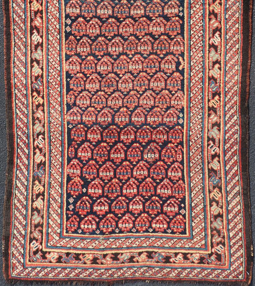 Antique Kurdish Gallery rug, Keivan Woven Arts / rug R20-0810, country of origin / type: Persian / Kurdish, circa Early-20th century.

Measures: 4'2 x 10'2.