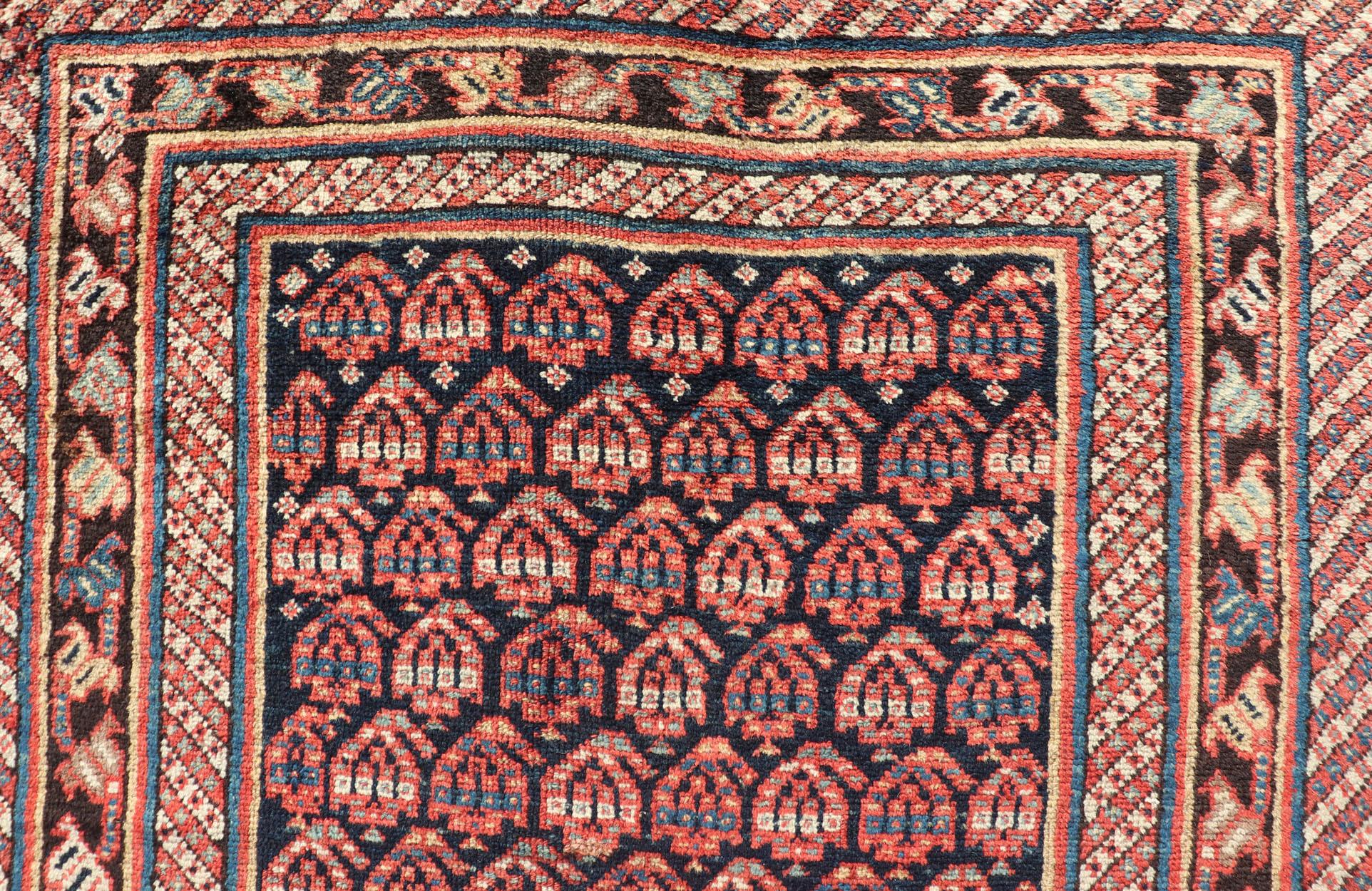 20th Century Antique Persian Kurdish Gallery Rug with All-Over Sub-Geometric Design For Sale