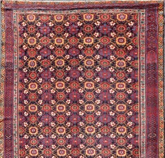 Antique Persian Kurdish Gallery Rug with an Intricate Floral Pattern 6'5 x 12'5