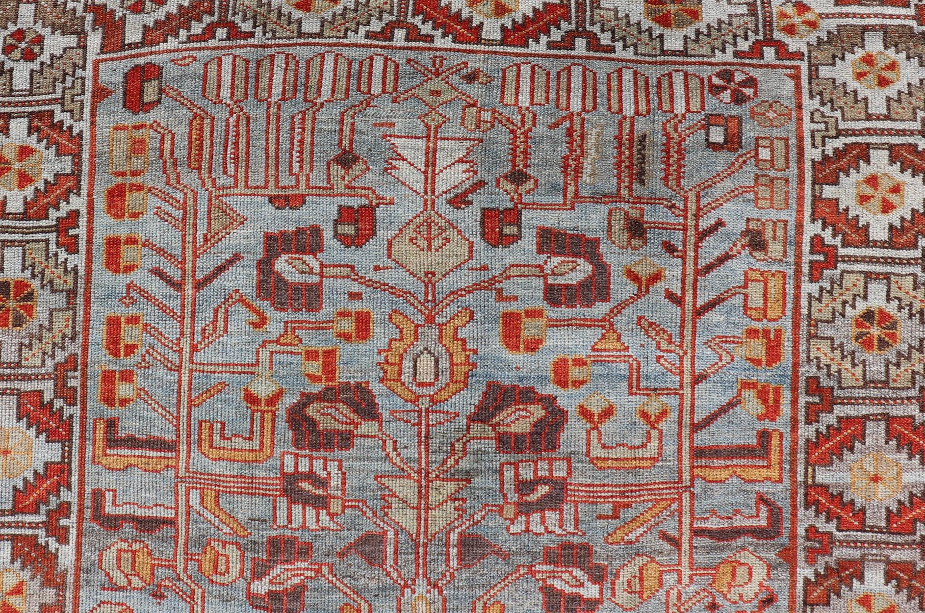 Antique Persian Kurdish Gallery Runner Rug in Wool with Tribal Medallion Design. Keivan Woven Arts; rug EMB-22224-15469, country of origin / type: Iran / Kurdish, circa 1900.
Measures: 4'11 x 11'9 
This antique Persian Kurdish rug has been