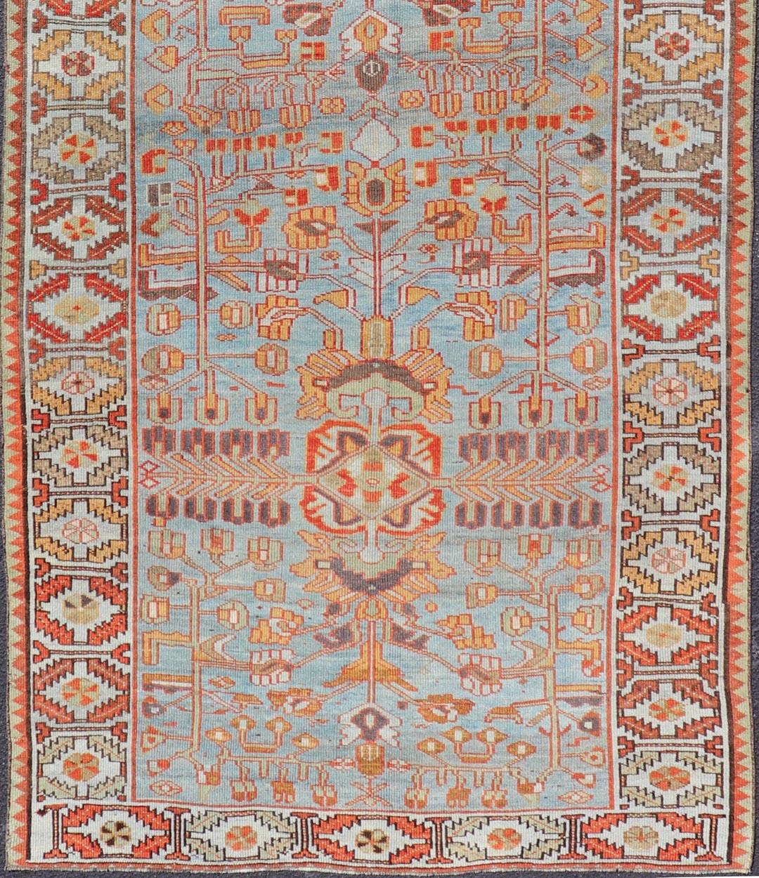 20th Century Antique Persian Kurdish Gallery Runner Rug in Wool with Tribal Medallion Design For Sale