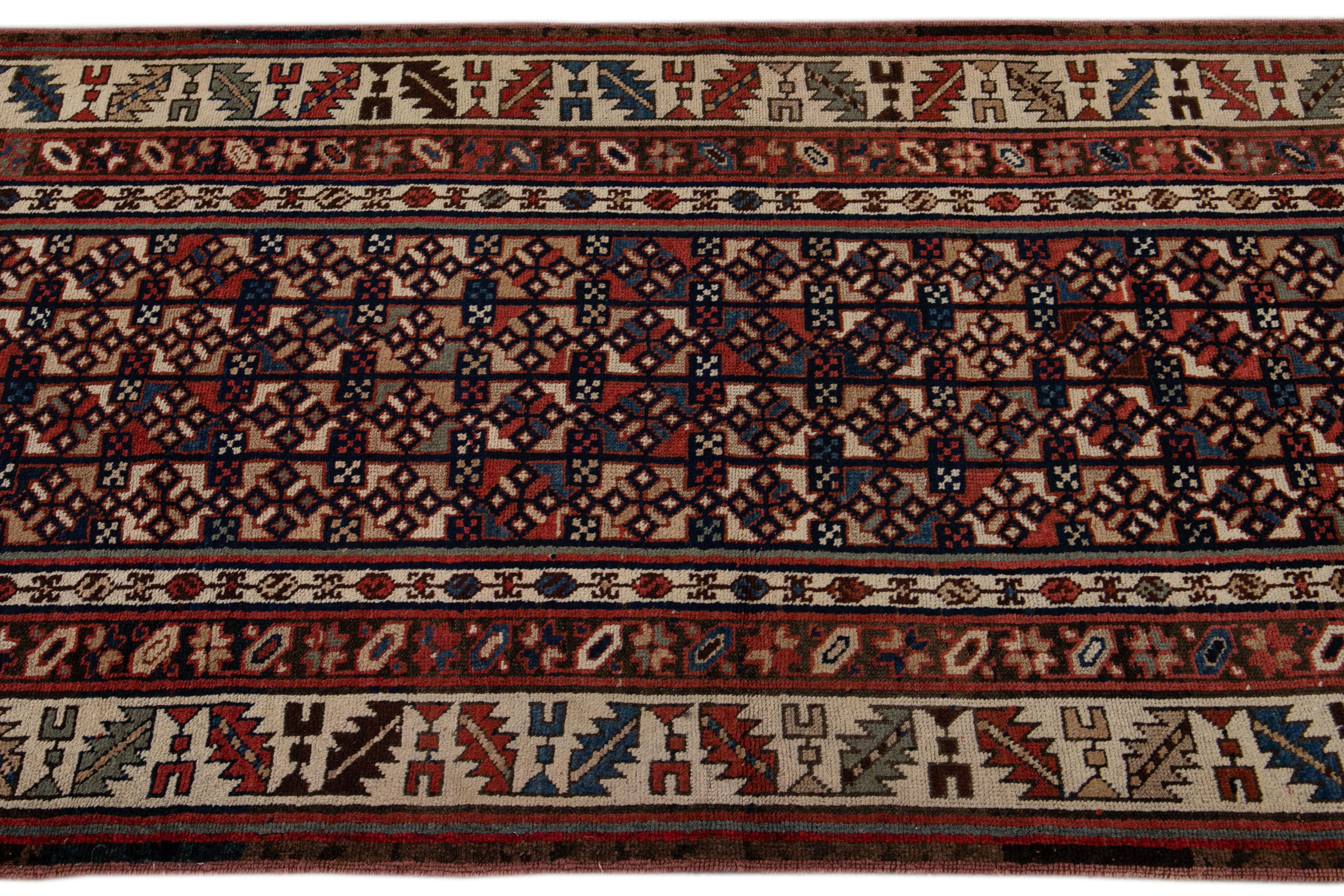 Early 20th Century Antique Persian Kurdish Handmade Allover Geometric Wool Runner For Sale