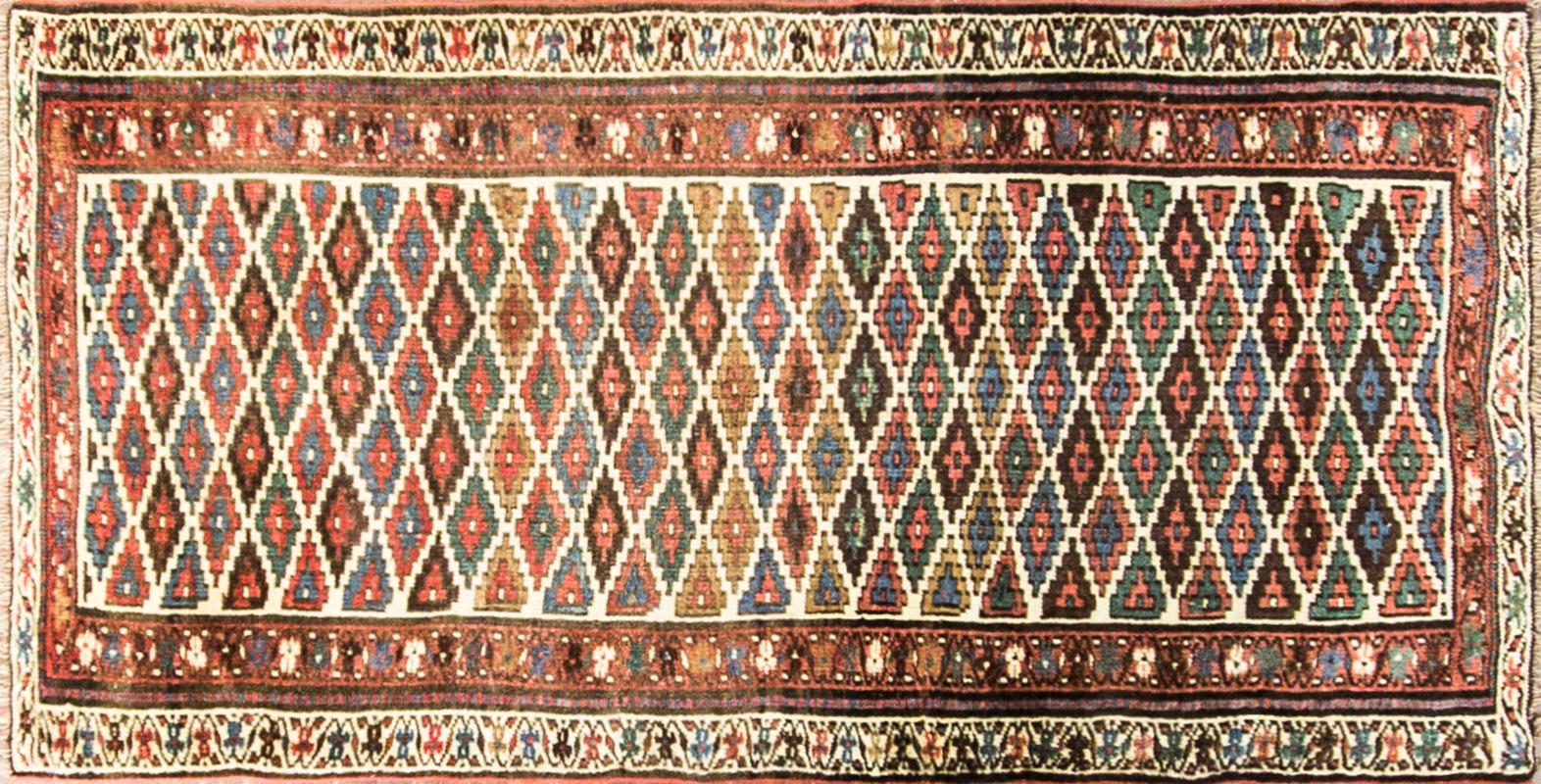 The province of Kurdistan is situated in the western part of Iran. Its capital today is Sanandaj, but in the context of carpets, the older name, Senneh, is still used. Around the province the Kurdish people weave strong, durable carpets with juicy