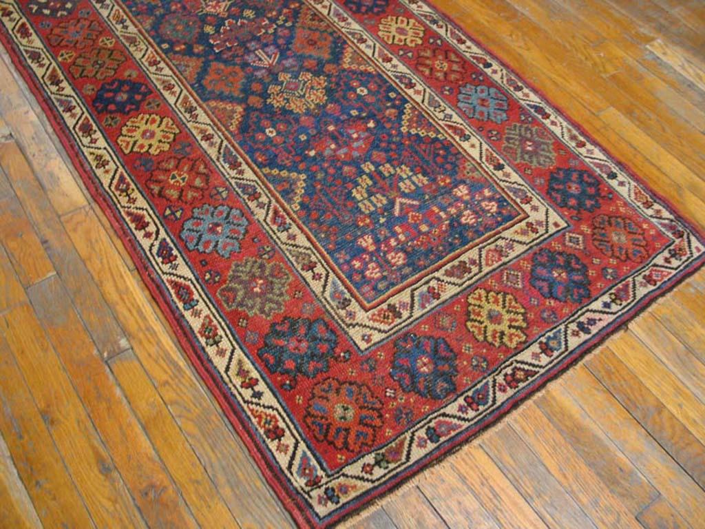 19th Century W. Persian Kurdish Carpet ( 3' x 14' - 90 x 427 )
The royal blue ground of this c. 1890 long piece has a mixture of flowering plants, stars, palmettes and other geometric devices, in alluring green, rose light blue and gold. The red