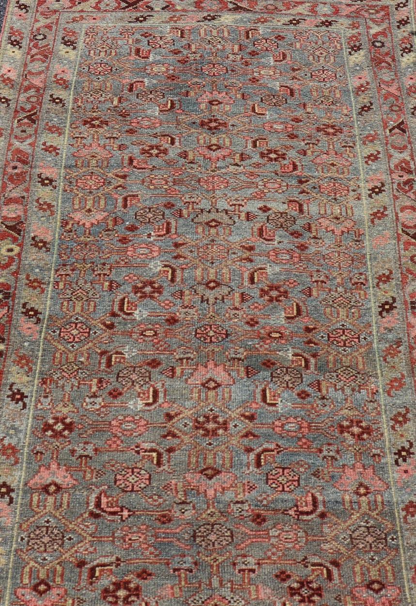 Measures: 3'2 x 6'3 

Antique Persian Kurdish Rug in Blue, Green, Brown, and Soft Red. Keivan Woven Arts / rug EMB-22168-15032, Keivan Woven Arts / country of origin / type: Iran / Kurdish, circa 1900.

This antique distressed Kurdish tribal rug
