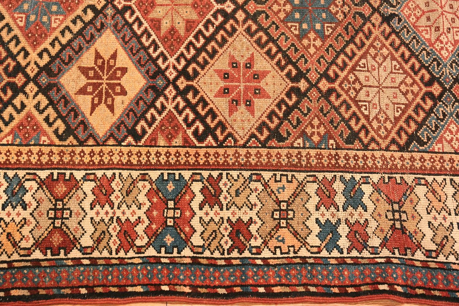 Beautiful Antique Persian Kurdish Rug, Country of Origin: Persia, Circa date: 1920 - Size: 5 ft 2 in x 11 ft 8 in (1.57 m x 3.56 m).