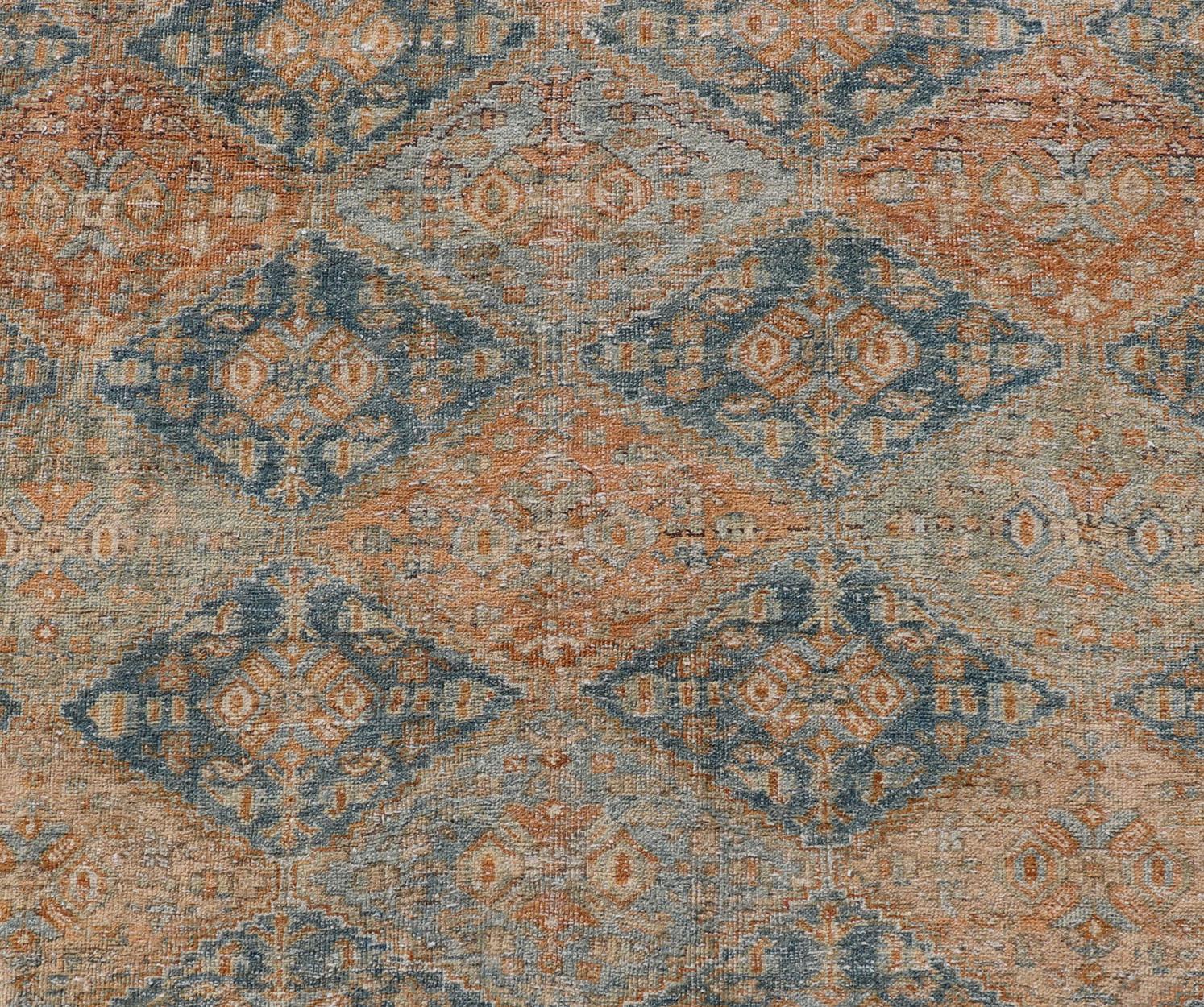 Antiker persischer Kurdischer Teppich mit geometrischem All-Over-Medaillon in Orange und Blau im Zustand „Gut“ im Angebot in Atlanta, GA
